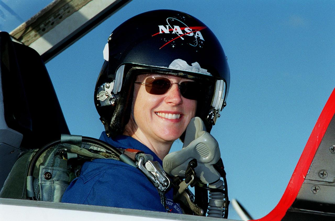 STS-92 Pilot Pamela Ann Melroy is happy to arrive at the KSC Shuttle Landing Facility after a flight from Houston. She and the rest of the crew are at KSC to take part in Terminal Countdown Demonstration Test activities, which include emergency egress training from the orbiter and pad, and a simulated countdown. The fifth mission to the International Space Station, STS-92 will carry the Integrated Truss Structure Z1, the first of the planned 10 trusses on the Space Station, and the third Pressurized Mating Adapter. The Z1 will allow the first U.S. solar arrays on a future flight to be temporarily installed on Unity for early power. PMA-3 will provide a Shuttle docking port for the solar array installation on the sixth ISS flight and Lab installation on the seventh ISS flight. STS-92 is scheduled to launch Oct. 5 from launch Pad 39A. It will be the 100th flight in the Shuttle program