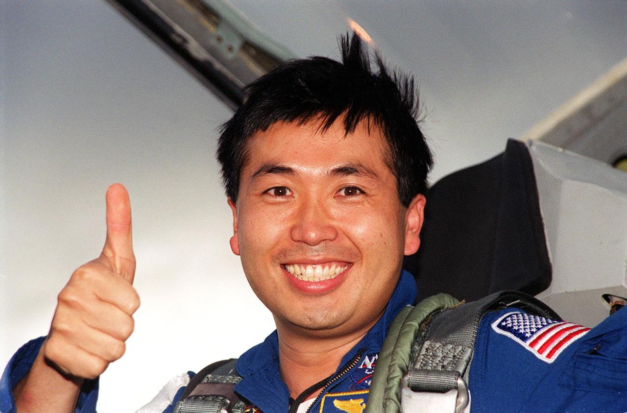 KENNEDY SPACE CENTER, FLA. -- For STS-92 Mission Specialist Koichi Wakata of Japan, arrival at KSC for launch of Space Shuttle Discovery on Oct. 5 is a thumbs-up experience. He and other crew members Commander Brian Duffy, Pilot Pamela Ann Melroy and Mission Specialists Leroy Chiao, Peter J.K. “Jeff” Wisoff, Michael E. Lopez-Alegria and William S. McArthur Jr. expressed their eagerness to launch to a waiting group of media at the Shuttle Landing Facility. The mission is the fifth flight for the construction of the International Space Station. The payload includes the Integrated Truss Structure Z-1 and the third Pressurized Mating Adapter. During the 11-day mission, four extravehicular activities (EVAs), or space walks, are planned