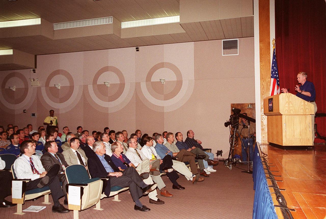 In the Training Auditorium at KSC, Center Director Roy Bridges addresses attendees at a presentation for Super Safety and Health Day. Safety Day is a full day of NASA-sponsored, KSC and 45th Space Wing events involving a number of health and safety related activities: Displays, vendors, technical paper sessions, panel discussions, a keynote speaker, etc. The entire Center and Wing stand down to participate in the planned events. Safety Day is held annually to proactively increase awareness in safety and health among the government and contractor workforce population. The first guiding principle at KSC is “Safety and Health First.” KSC’s number one goal is to “Assure sound, safe and efficient practices and processes are in place for privatized/commercialized launch site processing.