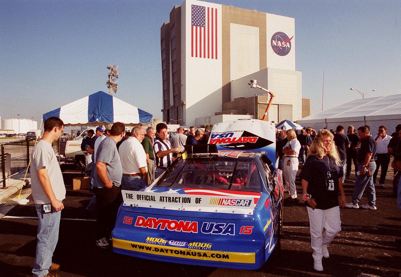 Employees take a look at this NASCAR auto being displayed during Super Safety and Health Day at KSC. Safety Day is a full day of NASA-sponsored, KSC and 45th Space Wing events involving a number of health and safety related activities: Displays, vendors, technical paper sessions, panel discussions, a keynote speaker, etc. The entire Center and Wing stand down to participate in the planned events. Safety Day is held annually to proactively increase awareness in safety and health among the government and contractor workforce population. The first guiding principle at KSC is “Safety and Health First.” KSC’s number one goal is to “Assure sound, safe and efficient practices and processes are in place for privatized/commercialized launch site processing.