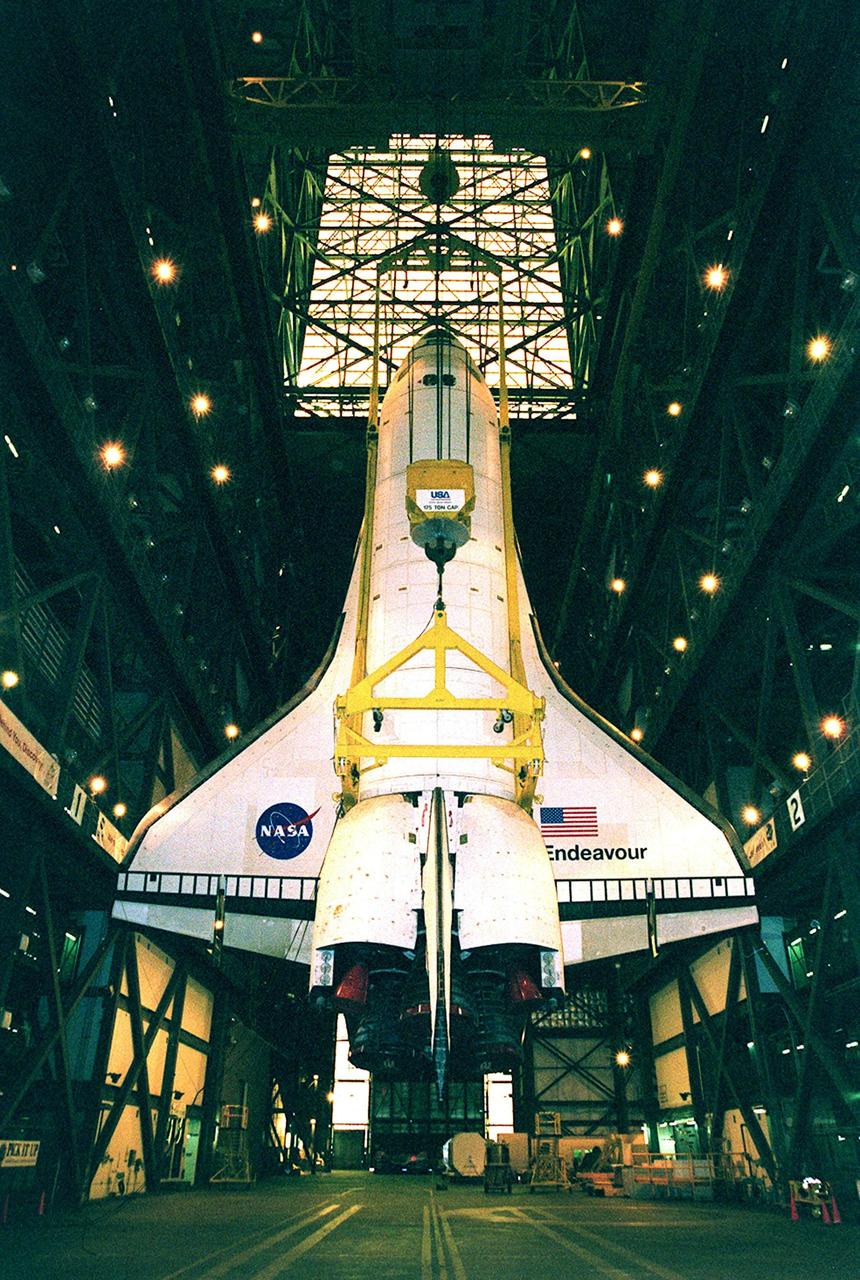 KENNEDY SPACE CENTER, FLA. -- The orbiter Endeavour hangs suspended from a crane inside the Vehicle Assembly Building. It will be lifted into high bay 1 and stacked with its external tank and solid rocket boosters. Space Shuttle Endeavour is scheduled to be launched Nov. 30 on mission STS-97, the sixth construction flight to the International Space Station