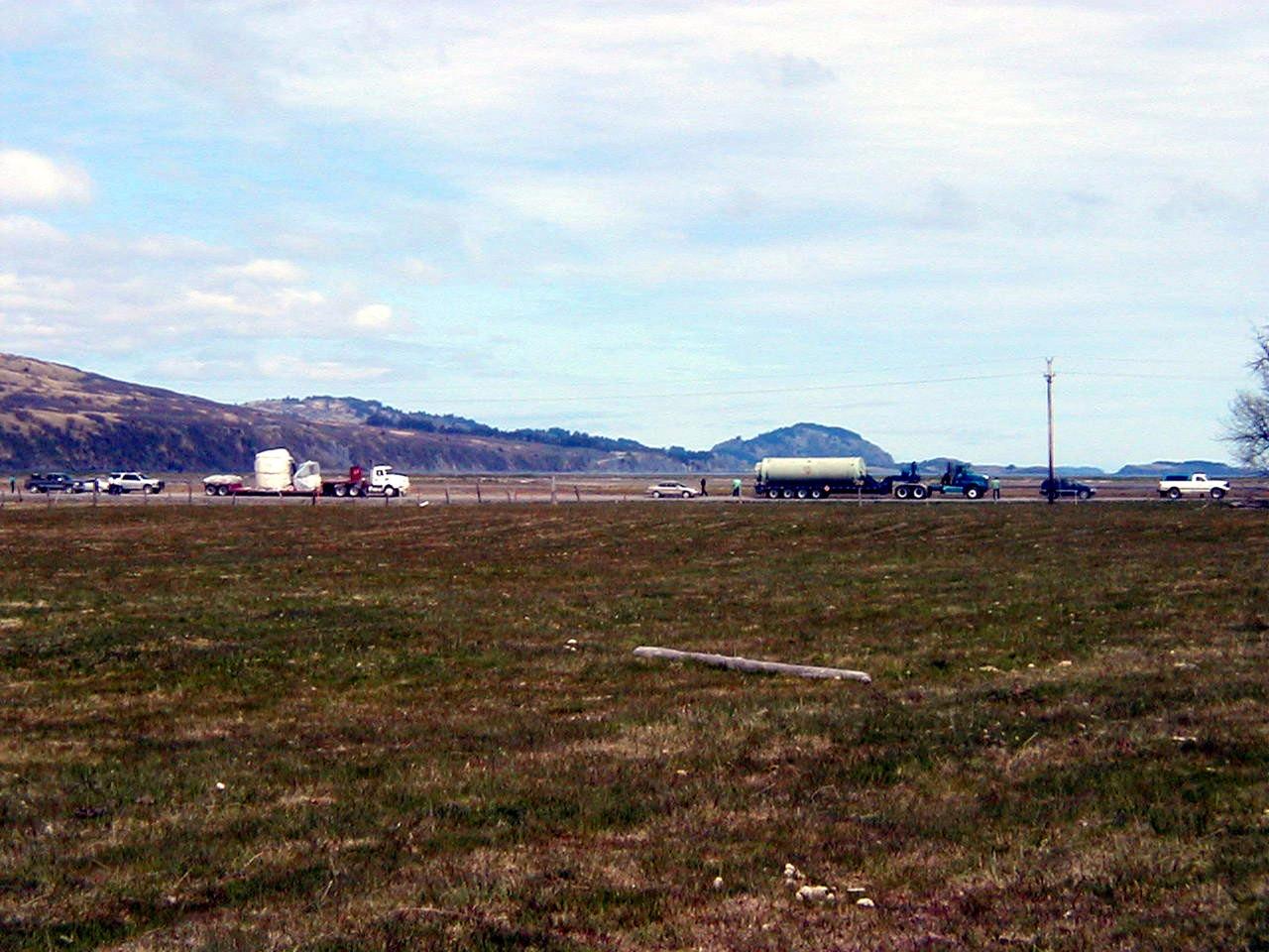 KODIAK ISLAND, Alaska -- A convoy of trucks transports the stages of an Athena launch vehicle and supporting launch equipment to the pad at Kodiak Island, Alaska, as preparations to launch the Kodiak Star continue.  The first orbital launch to take place from Alaska's Kodiak Launch Complex, Kodiak Star is scheduled to lift off on a Lockheed Martin Athena I launch vehicle on Sept. 17 during a two-hour window that extends from 5:00 to 7:00 p.m. ADT.  The payloads aboard include the Starshine 3, sponsored by NASA, and the PICOSat, PCSat and Sapphire, sponsored by the Department of Defense (DoD) Space Test Program.     