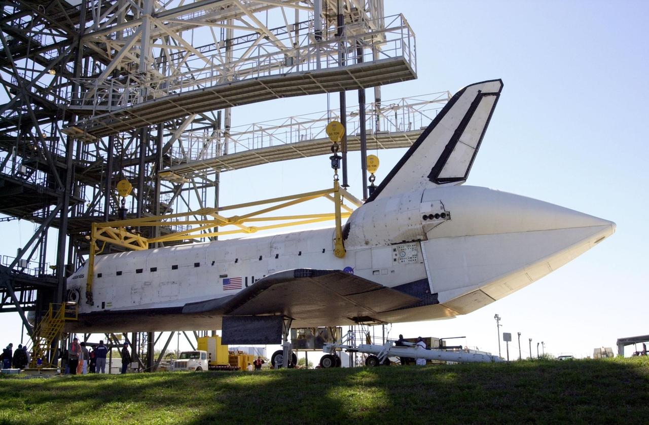 KENNEDY SPACE CENTER, FLA. -- Orbiter Atlantis is ready to have the overhead crane removed before transfer to the Orbiter Processing Facility. A tail cone covers the aft engines. Atlantis was removed from the back of a Shuttle Carrier Aircraft after a ferry flight from California. Atlantis landed Feb. 19 at Edwards Air Force Base concluding mission STS-98. The ferry flight began March 1; unfavorable weather conditions kept it on the ground at Altus AFB, Okla., until it could return to Florida. Atlantis will be transported to the Orbiter Processing Facility to prepare it for mission STS-104, the 10th construction flight to the International Space Station, scheduled to launch June 8