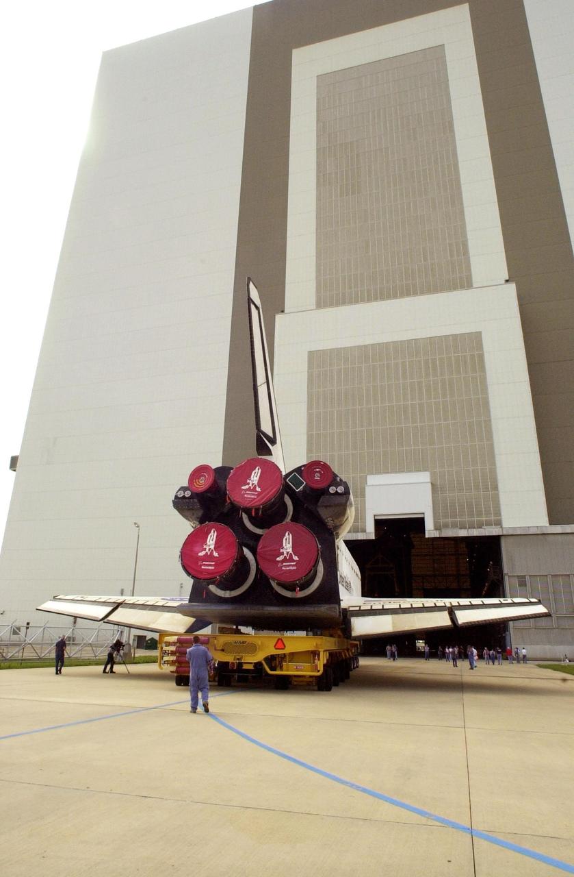 KENNEDY SPACE CENTER, FLA. -- Endeavour rolls into the open doors of the Vehicle Assembly Building. In the VAB, Endeavour will be stacked with its solid rocket boosters and external tank atop the Mobile Launcher Platform in high bay 3. Endeavour is scheduled to launch April 19 on mission STS-100, the ninth flight to the International Space Station
