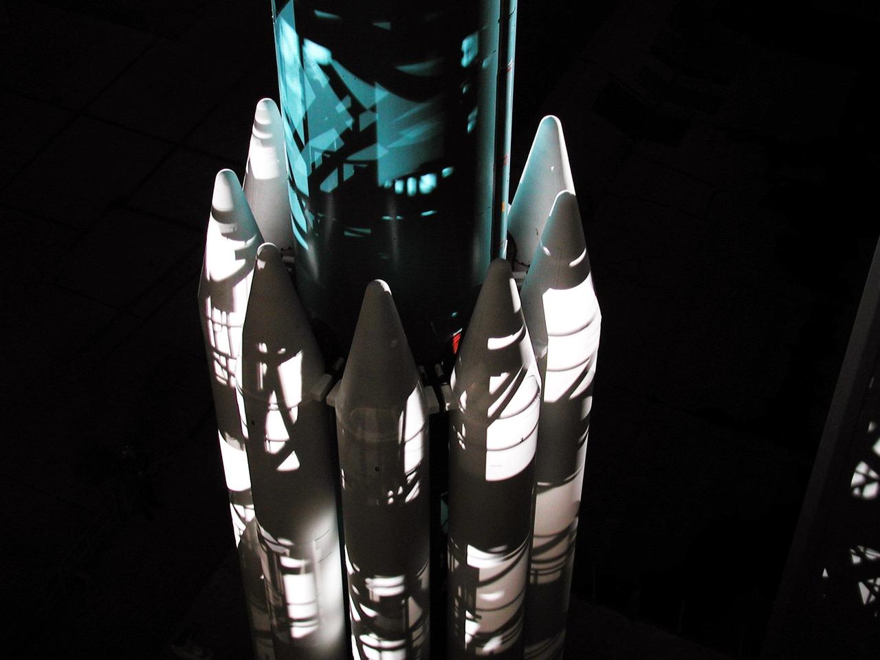 Shadows create a surrealistic image on the Boeing Delta II rocket and its booster rockets as the launch tower rolls away. The rocket is poised to carry the 2001 Mars Odyssey spacecraft into space on its 7-month journey to Mars. Liftoff is scheduled for 11:02 a.m. EDT from Launch Complex 17-A at Cape Canaveral Air Force Station. The spacecraft, built by Lockheed Martin Space Systems for the Jet Propulsion Laboratory, will orbit Mars, mapping the surface looking for geological features that could indicate the presence of water, now or in the past. Science gathered by three science instruments on board will be key to future missions to Mars, including orbital reconnaissance, lander and human missions