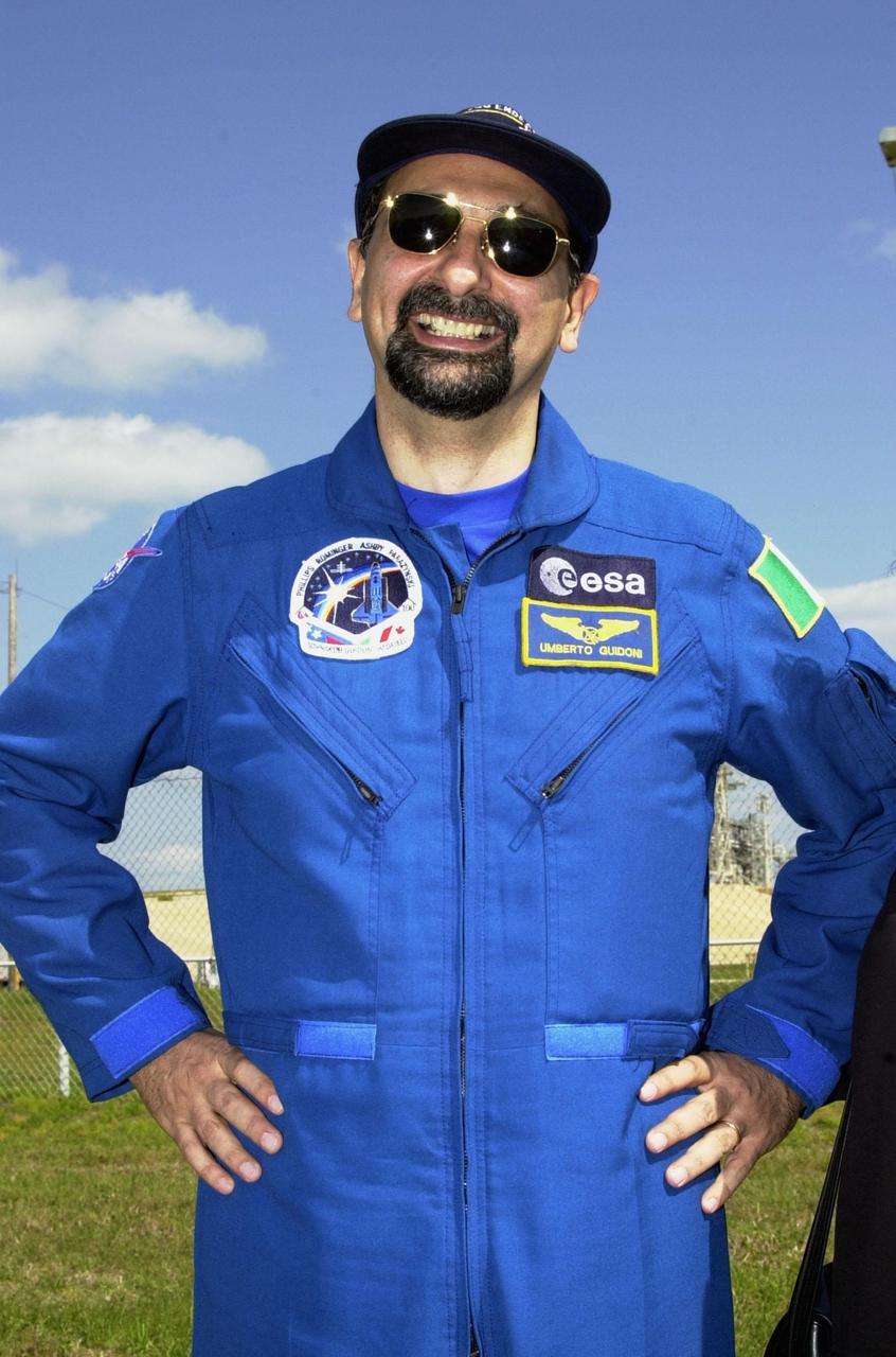 KENNEDY SPACE CENTER, FLA. -- STS-100 Mission Specialist Umberto Guidoni stands near Launch Pad 39A to greet family and friends. Guidoni is with the European Space Agency. The crew is at KSC to complete final flight plan reviews in anticipation of launch. The 11-day mission to the International Space Station will deliver and integrate the Spacelab Logistics Pallet/Launch Deployment Assembly, which includes the Space Station Remote Manipulator system and the UHF Antenna, and the Multi-Purpose Logistics Module Raffaello. The mission includes two planned spacewalks for installation of the SSRMS. The mission is also the inaugural flight of the MPLM Raffaello, carrying resupply stowage racks and resupply/return stowage platforms. Liftoff on mission STS-100 is scheduled at 2:41 p.m. EDT April 19