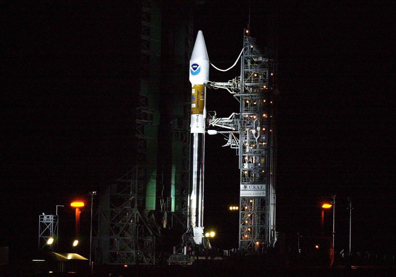 KENNEDY SPACE CENTER, Fla. -- The GOES-M satellite is poised for flight at Launch Complex 36-A, Cape Canaveral Air Force Station, after rollback of the Mobile Service Tower. GOES-M is the last in the current series of advanced geostationary weather satellites in service. GOES-M has a new instrument not on earlier spacecraft, a Solar X-ray Imager, which can be used in forecasting space weather and the effects of solar storms. The satellite is scheduled to launch atop an Atlas rocket on July 23 during a window that extends from 3:02 to 4:26 a.m. EDT