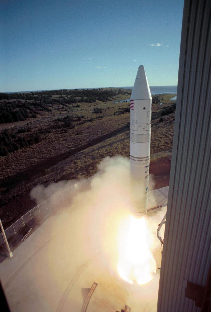 KODIAK ISLAND, Alaska. -- With light still on the horizon, a Lockheed Martin Athena I launch vehicle lifts off the launch pad at Kodiak Launch Complex (KSC) with the Kodiak Star spacecraft on board. Liftoff occurred at 10:40 p.m. EDT, Sept. 29. The Kodiak Star payload consists of four satellites: PICOSat, PCSat, Sapphire and Starshine 3. Starshine is sponsored by NASA. The 200-pound sphere will be used by students to study orbital decay. The other three satellites, also on educational missions, are sponsored by the department of defense. PICOSat is a technology demonstration satellite with four experiments on board. PCSat was designed by midshipmen at the U.S. Naval Academy, and will become part of the amateur radio community's automatic position reporting system. Sapphire is a micro-satellite built by students at Stanford University and Washington University - St. Louis to test infrared sensors for space use. KLC is the newest commercial launch complex in the United States, ideal for launch payloads requiring low-Earth polar or sun-synchronous orbits