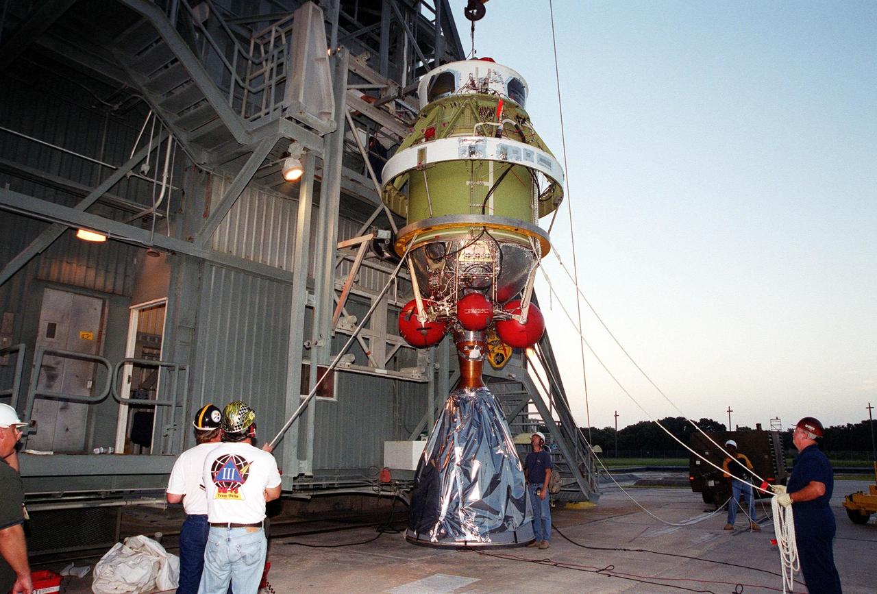 KENNEDY SPACE CENTER, Fla. -- After being raised to a vertical position, the second stage of a Delta II rocket is ready to be lifted up the gantry on Launch Complex 17-A, Cape Canaveral Air Force Station, where it will be mated with the first stage. The Delta II will propel the Genesis spacecraft on a journey to capture samples of the ions and elements in the solar wind and return them to Earth for scientists to use to determine the exact composition of the Sun and the solar system’s origin. NASA’s Genesis project in managed by the Jet Propulsion Laboratory in Pasadena, Calif. Lockheed Martin Astronautics built the Genesis spacecraft for NASA in Denver, Colo. The launch is scheduled for July 30 at 12:36 p.m. EDT