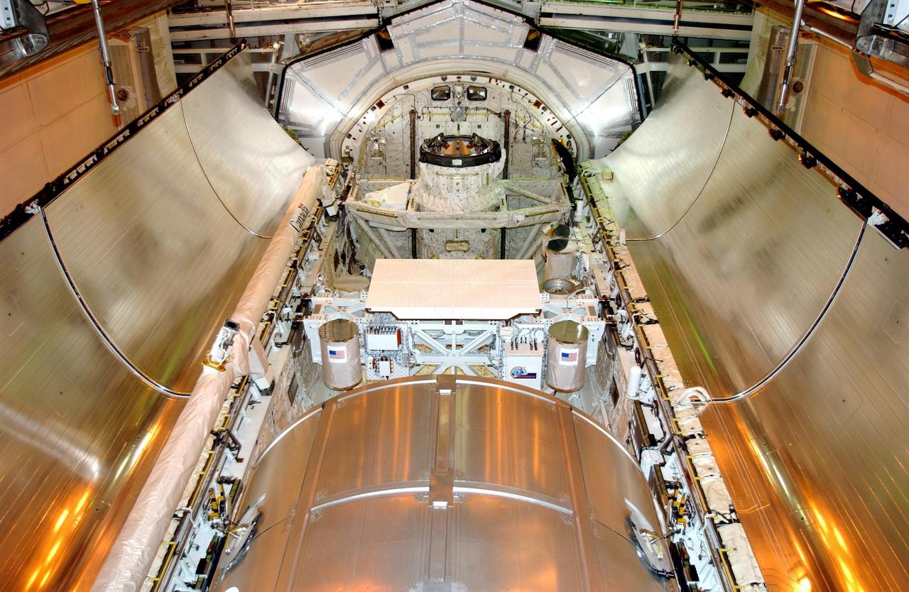 KENNEDY SPACE CENTER, Fla. -- Space Shuttle Endeavour's payload bay doors are ready for closure and launch on mission STS-108. Inside the bay is the Multi-Purpose Logistics Module Raffaello (foreground), carrying supplies, equipment and experiments for the International Space Station. Sharing the payload bay are several carriers with varying experiment packages, such as Starshine-2, a Get-Away Special. Endeavour is scheduled to launch Nov. 29 on this first Utilization Flight to the International Space Station. Endeavour will also carry the replacement Expedition 4 crew to the Station and return to Earth with the Expedition 3 crew