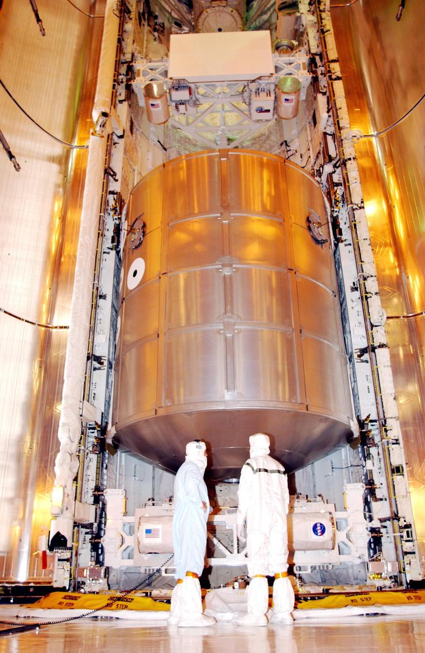 KENNEDY SPACE CENTER, Fla. - Space Shuttle Endeavour's payload bay doors are ready for closure and launch on mission STS-108. Inside the bay is the Multi-Purpose Logistics Module Raffaello, carrying supplies, equipment and experiments for the International Space Station. Surrounding the MPLM are several carriers with varying experiment packages, such as Starshine-2, a Get-Away Special. Endeavour is scheduled to launch Nov. 29 on this first Utilization Flight to the International Space Station. Endeavour will also carry the replacement Expedition 4 crew to the Station and return to Earth with the Expedition 3 crew