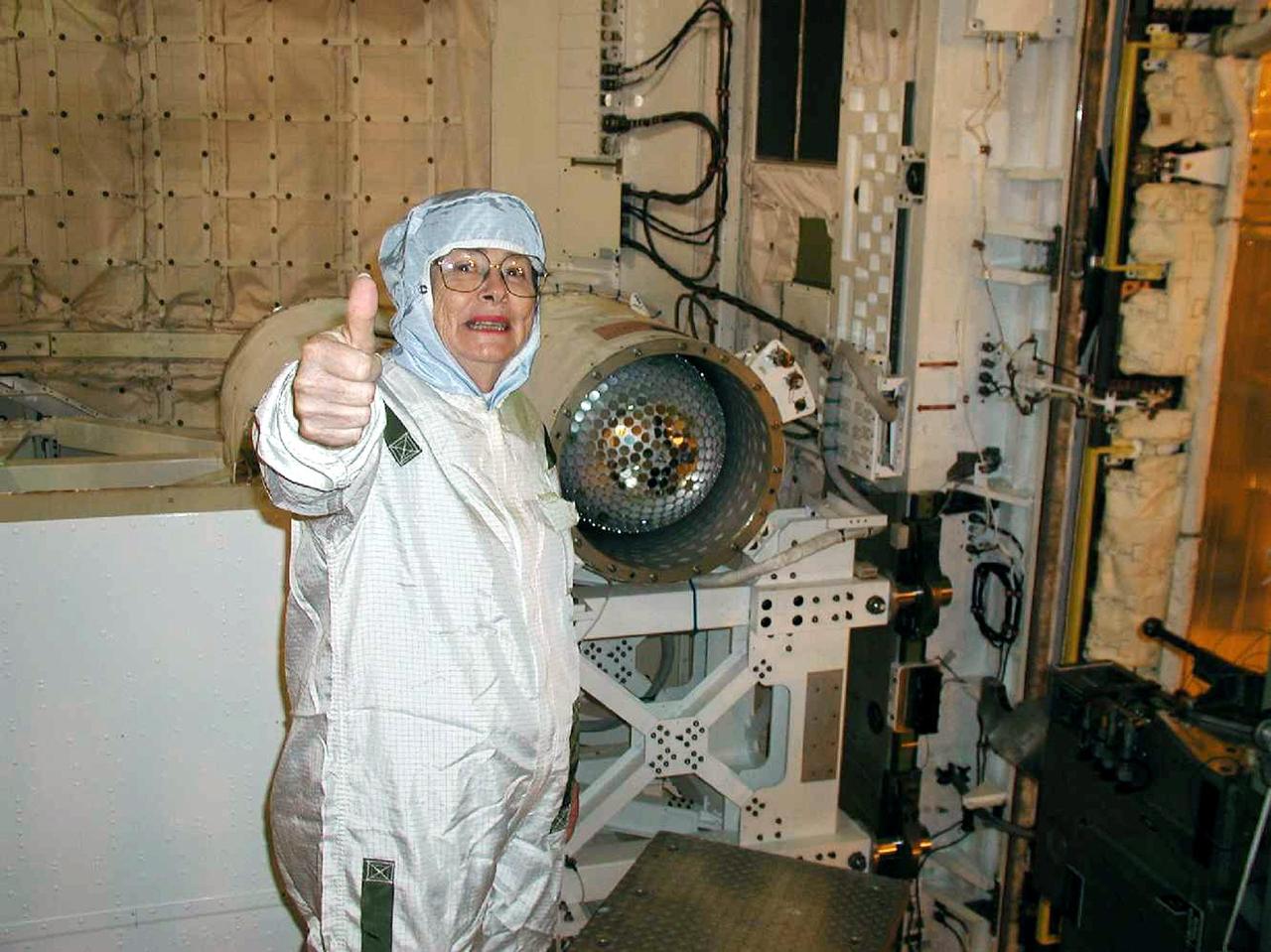 KENNEDY SPACE CENTER, Fla. -- From inside the payload bay of orbiter Endeavour, Phyllis Moore, co-director of Project Starshine, gives her final approval to flight of the Starshine-2 satellite. The deployable experiment is being carried on mission STS-108.  Starshine-2's 800 aluminum mirrors were polished by more than 25,000 students from 26 countries. Top priorities for the STS-108 (UF-1) mission of Endeavour are rotation of the International Space Station Expedition Three and Expedition Four crews, bringing water, equipment and supplies to the station in the Multi-Purpose Logistics Module Raffaello, and completion of robotics tasks and a spacewalk to install thermal blankets over two pieces of equipment at the bases of the Space Station's solar wings. Liftoff of Endeavour on mission STS-108 is scheduled for 7:41 p.m. EST Nov. 29