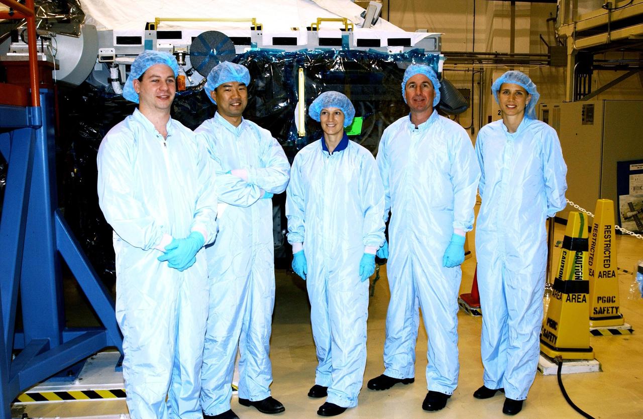 KENNEDY SPACE CENTER, FLA. - Members of the  STS-114 crew pose for a photo during training.   Standing left to right are Pilot James Kelly, Mission Specialist Soichi Noguchi, Commander Eileen Collins and Mission Specialist Stephen Robinson.  At far right is Mission Specialist Sandra Magnus, a member of the STS-112 crew.   Noguchi is with the National Space and Development Agency of Japan.  STS-114 is a utilization and logistics flight that will carry Multi-Purpose Logistics Module Raffaello and the External Stowage Platform (ESP-2), plus the Expedition 7 crew to the International Space Station.  Launch of STS-114 is currently scheduled for January 2003