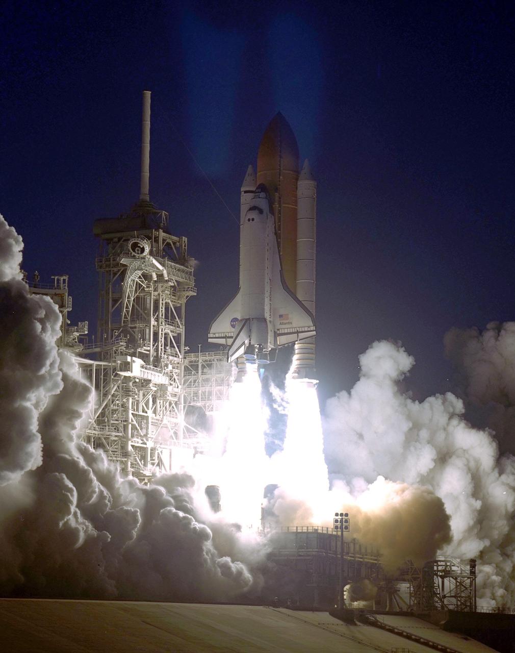 Space Shuttle Atlantis blasts into the sky from Launch Pad 39A on mission STS-98. Liftoff occurred at 6:13:02 p.m. EST. Along with a crew of five, Atlantis is carrying the U.S. Laboratory Destiny, a key module in the growth of the Space Station. Destiny will be attached to the Unity node on the Space Station using the Shuttle’s robotic arm. Three spacewalks are required to complete the planned construction work during the 11-day mission. This mission marks the seventh Shuttle flight to the Space Station, the 23rd flight of Atlantis and the 102nd flight overall in NASA’s Space Shuttle program. The planned landing is at KSC Feb. 18 about 1 p.m