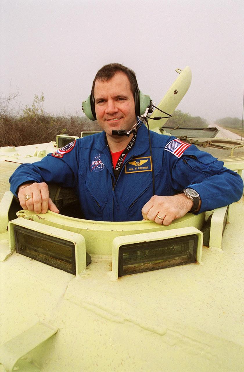 STS-102 Mission Specialist Paul Richards is ready to drive the M-113 armored carrier, part of emergency egress training at Launch Pad 39B. In the event of an emergency at the pad prior to launch, the M-113 could be used to transport the crew to a nearby bunker or farther. The STS-102 crew is at KSC to take part in Terminal Countdown Demonstration Test activities, which also include a simulated launch countdown. STS-102 is the eighth construction flight to the International Space Station, carrying as payload the Multi-Purpose Logistics Module Leonardo. Launch on mission STS-102 is scheduled for March 8