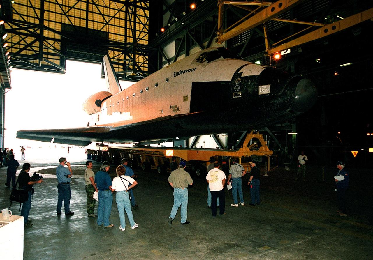 KENNEDY SPACE CENTER, FLA. -- Endeavour arrives in the transfer aisle of the Vehicle Assembly Building after rollover from Orbiter Processing Facility bay 2. In the VAB, Endeavour will be lifted to vertical and transferred to high bay 3 for stacking with its solid rocket boosters and external tank atop the Mobile Launcher Platform. Endeavour is scheduled to launch April 19 on mission STS-100, the ninth flight to the International Space Station