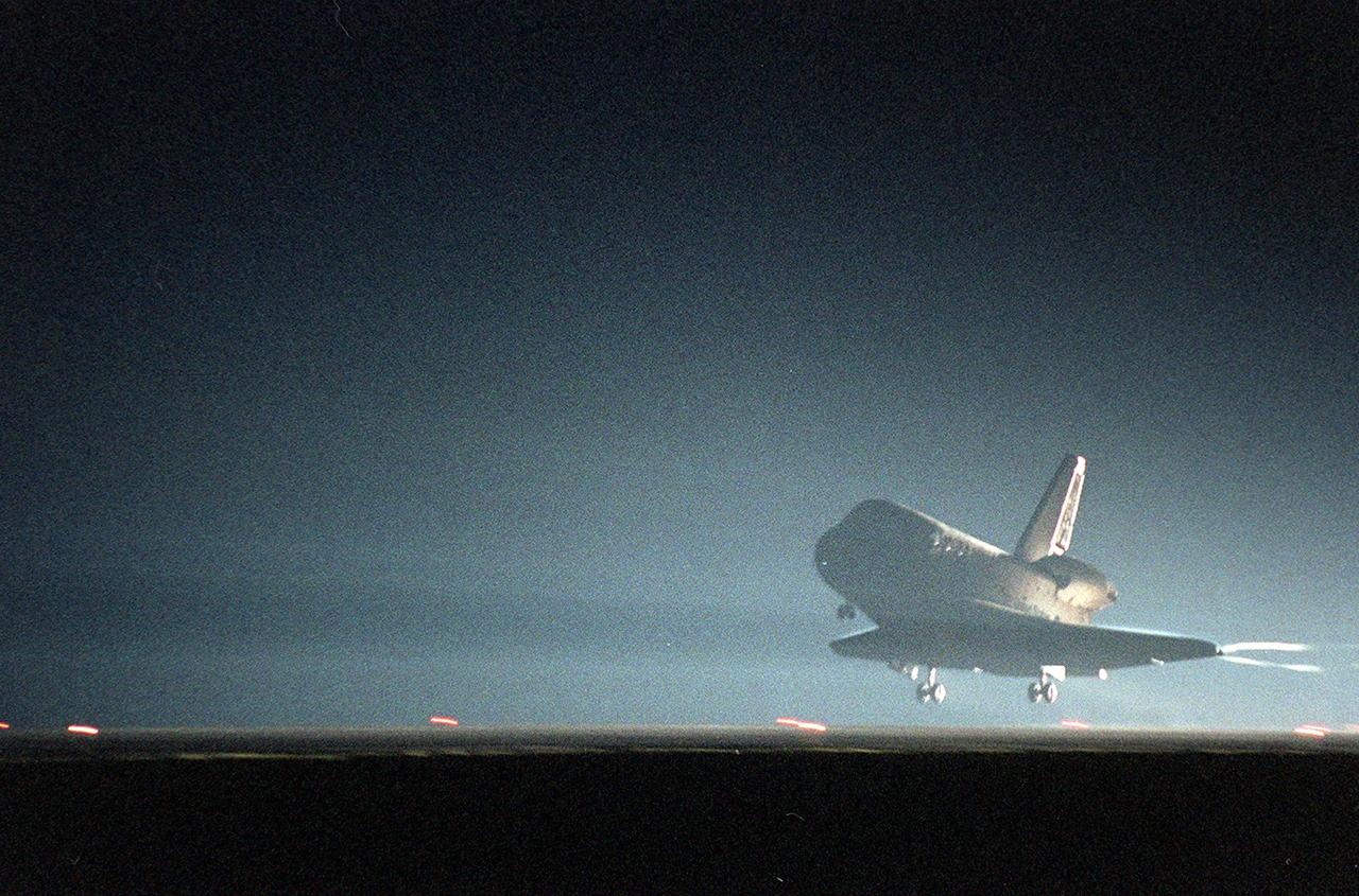 KENNEDY SPACE CENTER, Fla. -- Space Shuttle Discovery prepares to land at the KSC Shuttle Landing Facility on runway 15. Main gear touchdown occurred about 2:31:42 a.m. EST, nose wheel touchdown at 2:31:54 a.m., and wheel stop at 2:33:06 a.m. The landing, on orbit 201, concluded mission STS-102, the eighth flight to the International Space Station, carrying the first Multi-Purpose Logistics Module Leonardo, to the ISS and Expedition Two, a replacement crew for the Station. The 12-day, 19-hour, 51-minute mission returned both the Leonardo and the first resident crew of the ISS, Expedition One, to KSC. Discovery logged 5.3 million miles on this mission. The landing marked the 54th at KSC in the history of the program, and the 12th night landing at KSC