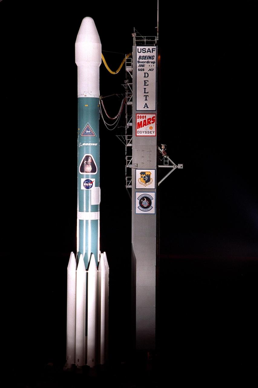 Spotlights capture the Boeing Delta II rocket waiting on Launch Complex 17, Cape Canaveral Air Force Station, to launch the 2001 Mars Odyssey spacecraft into space on its 7-month journey to Mars. Liftoff is scheduled for 11:02 a.m. EDT from Launch Complex 17-A at Cape Canaveral Air Force Station. The spacecraft, built by Lockheed Martin Space Systems for the Jet Propulsion Laboratory, will orbit Mars, mapping the surface looking for geological features that could indicate the presence of water, now or in the past. Science gathered by three science instruments on board will be key to future missions to Mars, including orbital reconnaissance, lander and human missions