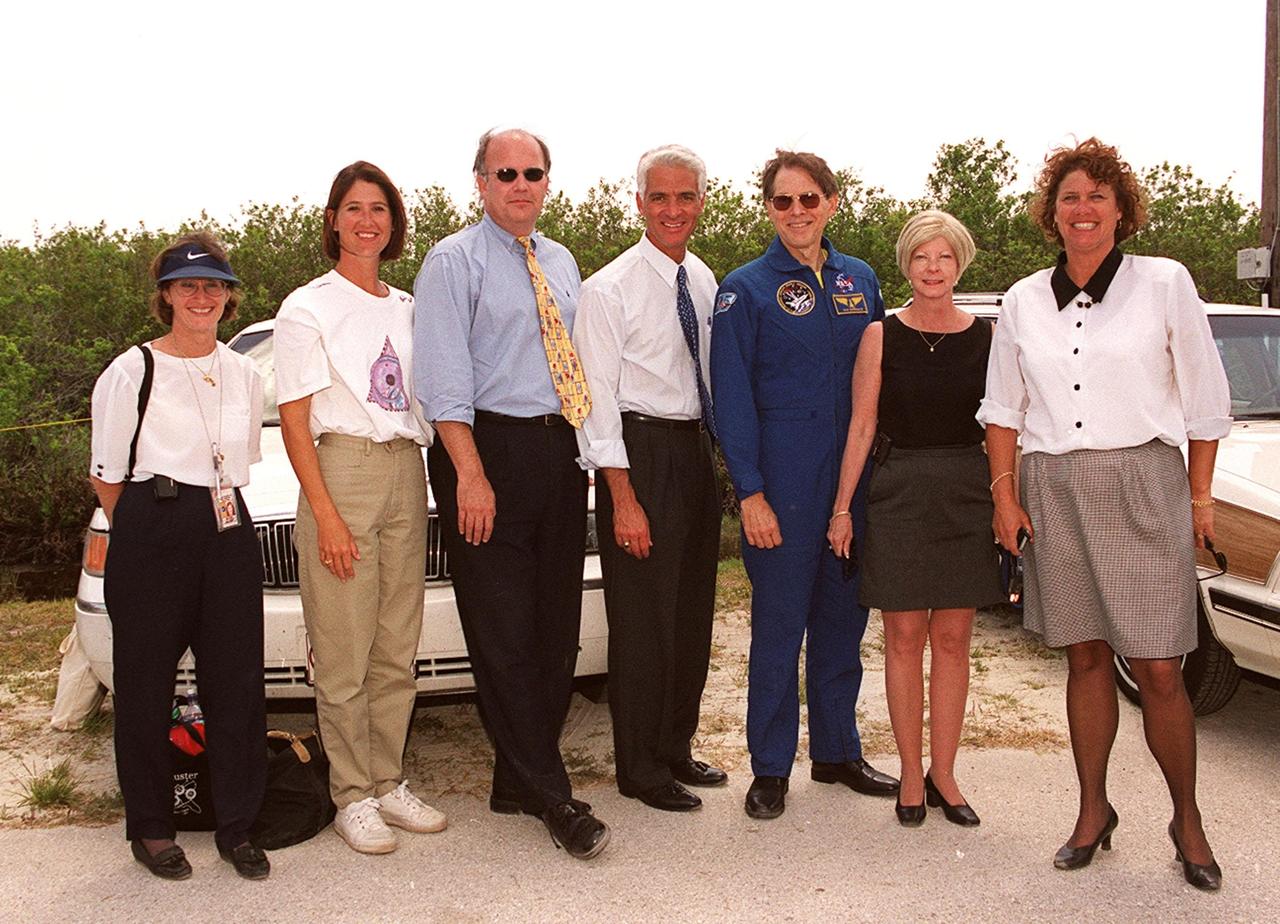 KENNEDY SPACE CENTER, FLA. -- Commemorating the 20th anniversary of Space Shuttle program, the State Education Commissioner Charlie Crist (center), visits KSC for the launch of Space Shuttle Endeavour on mission STS-100.He accompanied 24 students from Ronald McNair Magnet School, Cocoa, and astronaut Sam Durrance for the launch.Standing, left to right, are Pam Biegert; Nicole Waxberg; Jay Burmer, FDOE Director, Central Florida Office; Crist; Durrance; JoAnn Carrin, Deputy Communications Director Office of the Commissioner; and Ronda Federspiel, FDOE, Director of Special Projects. The students were chaperoned by Waxberg, who is a teacher at McNair School.