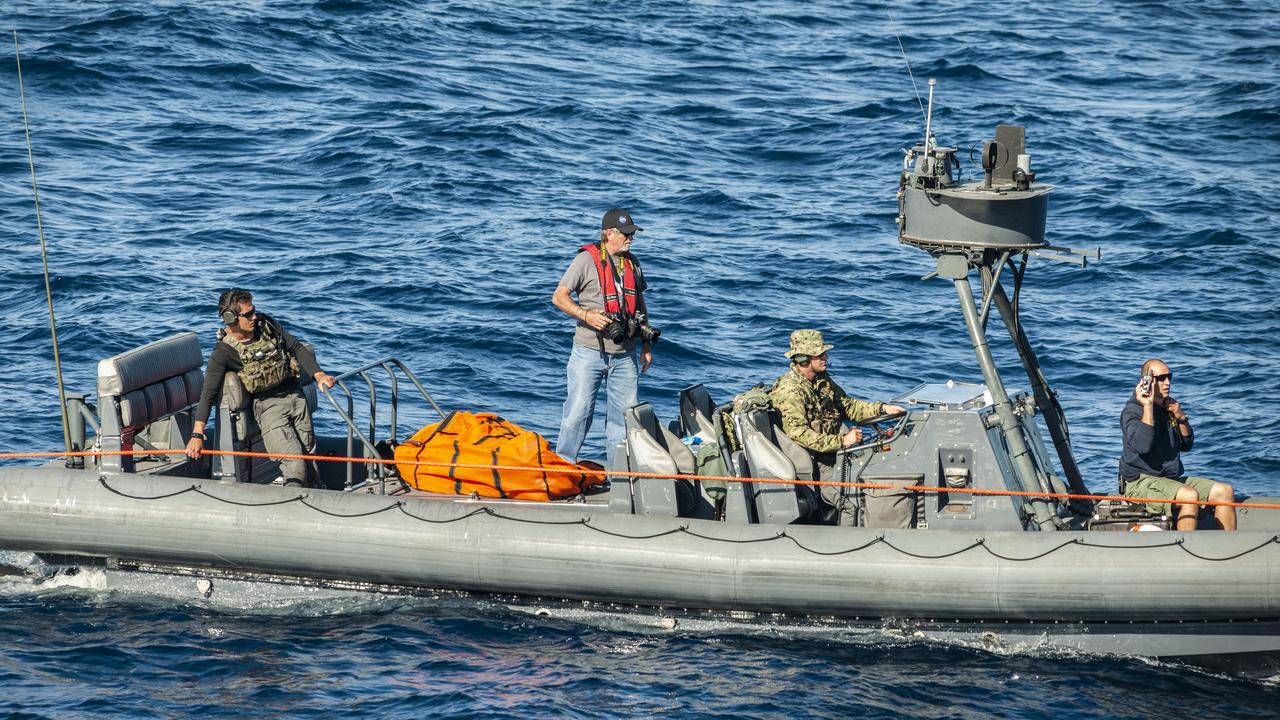 NASA Recovery Team members aboard a rigid hull boat monitor the winch line attached to a test version of the Orion capsule during Underway Recovery Test-7 (URT-7) on Oct. 31, 2018, in the Pacific Ocean. URT-7 is one in a series of tests that the EGS Recovery Team, along with the U.S. Navy, are conducting to verify and validate procedures and hardware that will be used to recover the Orion spacecraft after it splashes down in the Pacific Ocean following deep space exploration missions. Orion will have emergency abort capability, sustain the crew during space travel and provide safe re-entry from deep space return velocities.