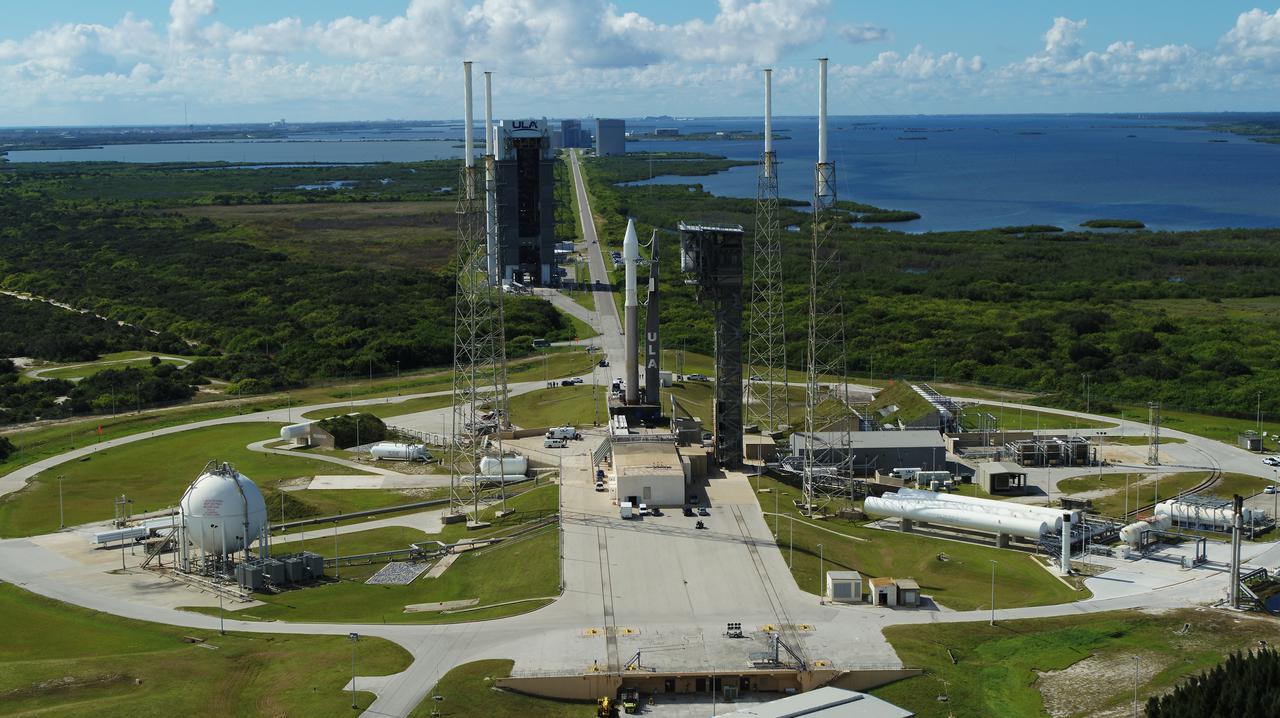 A United Launch Alliance V 401 rocket, with NASA’s Lucy spacecraft atop, arrives at Cape Canaveral Space Force Station’s Space Launch Complex 41 after making the short trek from the Vertical Integration Facility on Thursday, Oct. 14, 2021, in preparation for its targeted 5:34 a.m. EDT liftoff on Saturday, Oct. 16. NASA’s Launch Services Program, based at Kennedy Space Center, is managing the launch. During its 12-year primary mission, Lucy will explore a record-breaking number of asteroids, flying by one asteroid in the solar system’s main belt and seven Trojan asteroids. Additionally, Lucy’s path will circle back to Earth three times for gravity assists, making it the first spacecraft ever to return to the vicinity of Earth from the outer solar system.