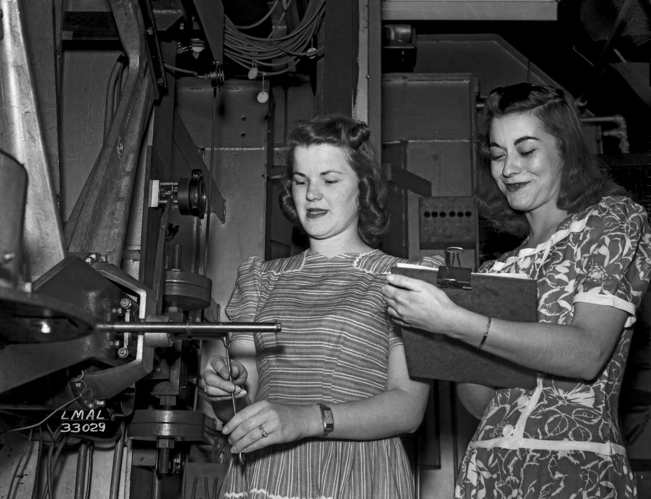 Women Adequately Filling Posts in NACA Laboratory: Nearly 200 women are employed at the Langley Laboratory of the National Advisory Committee for Aeronautics in a limited capacity as mechanics’ helpers and minor laboratory aids on the jobs formerly handled by men, according to E.H. Derring, of the Aerodynamics Division. Many phases of the operations of various wind tunnels at the laboratory are now handled by women with experienced male supervision. Mr. Derring said, pointing out that the reading of the data indicated on wind tunnel instruments during a test is done in a large measure by women.  In addition to reading the instruments and computing and integrating engineering test data obtained from tunnel investigations, the minor laboratory aides assist in the preparation of aircraft models preliminary to testing. Women employees who will serve in the Aerodynamics Division of the Laboratory attend an orientation class for two weeks, during which they receive instruction on phases of the work they will do and their aptitudes for different types of work are evaluated in order that they may be properly placed.  More than 100 women are employed in minor laboratory apprentices, performing mechanical work heretofore done by men. These women are employed in the various shops of the laboratory.  Women in the woodworking shops are taught to operate 15 different machines in carrying out their assignments. Norfolk new paper article from 1943 by Lee Dickinson.