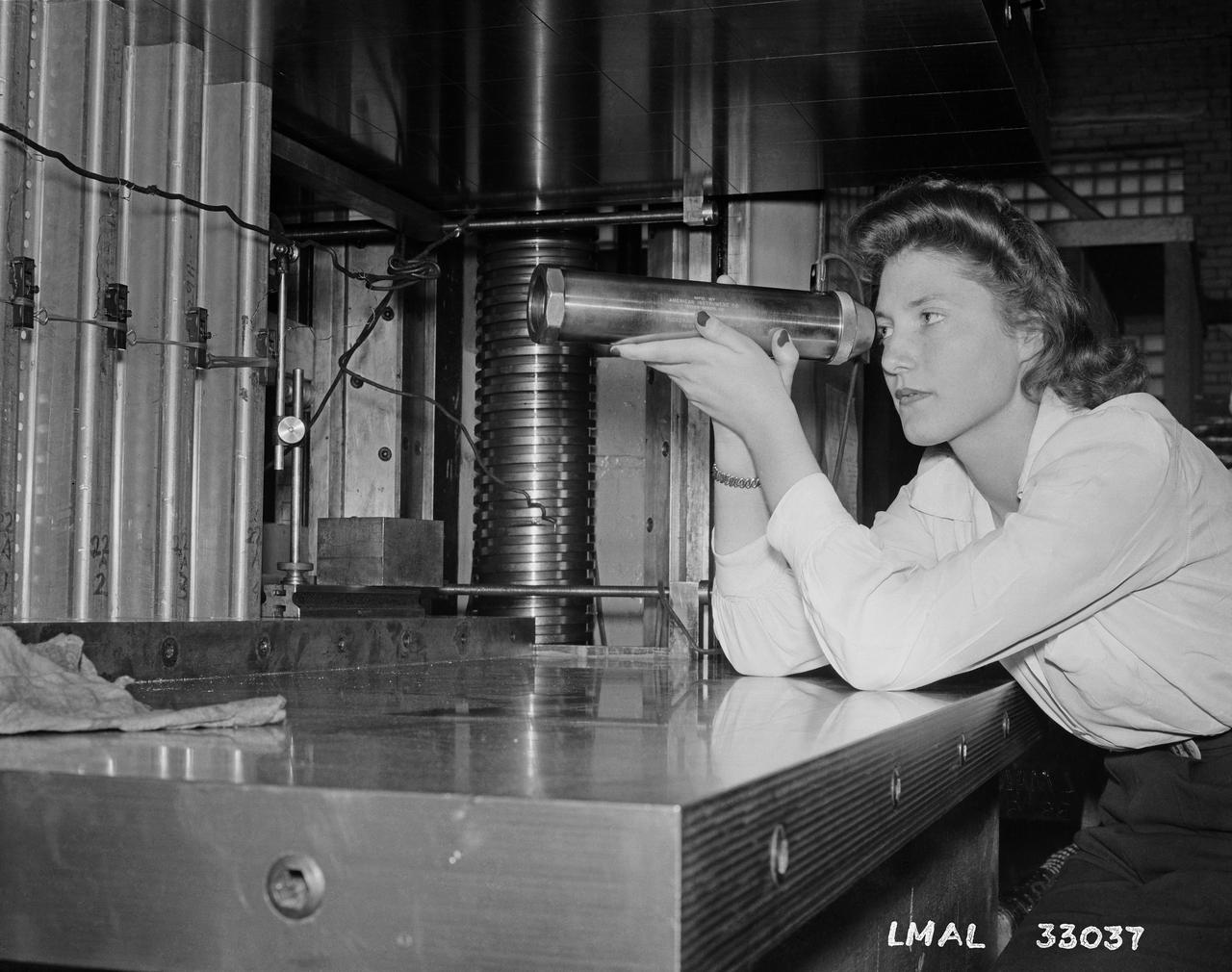 Women Adequately Filling Posts in NACA Laboratory: Nearly 200 women are employed at the Langley Laboratory of the National Advisory Committee for Aeronautics in a limited capacity as mechanics’ helpers and minor laboratory aids on the jobs formerly handled by men, according to E.H. Derring, of the Aerodynamics Division. Many phases of the operations of various wind tunnels at the laboratory are now handled by women with experienced male supervision. Mr. Derring said, pointing out that the reading of the data indicated on wind tunnel instruments during a test is done in a large measure by women.  In addition to reading the instruments and computing and integrating engineering test data obtained from tunnel investigations, the minor laboratory aides assist in the preparation of aircraft models preliminary to testing. Women employees who will serve in the Aerodynamics Division of the Laboratory attend an orientation class for two weeks, during which they receive instruction on phases of the work they will do and their aptitudes for different types of work are evaluated in order that they may be properly placed.  More than 100 women are employed in minor laboratory apprentices, performing mechanical work heretofore done by men. These women are employed in the various shops of the laboratory.  Women in the woodworking shops are taught to operate 15 different machines in carrying out their assignments. Norfolk new paper article from 1943 by Lee Dickinson.