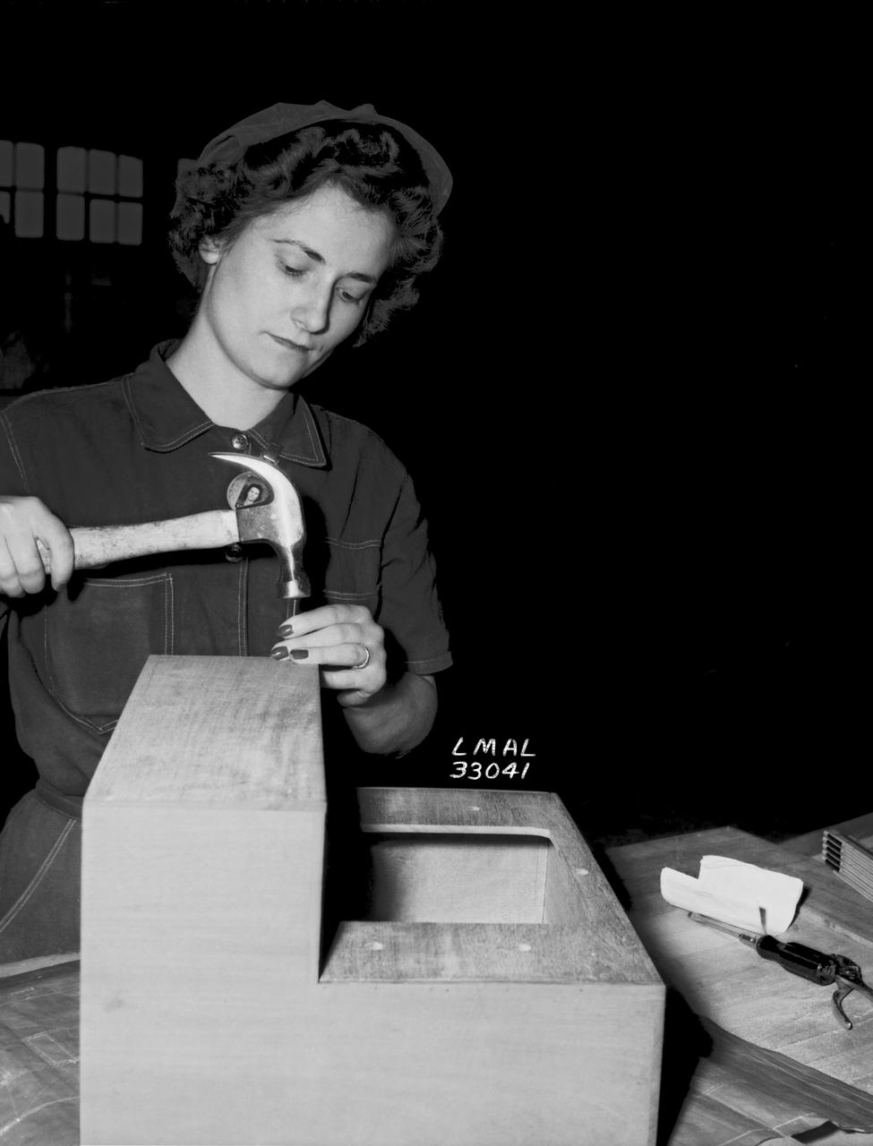 Women Adequately Filling Posts in NACA Laboratory: Nearly 200 women are employed at the Langley Laboratory of the National Advisory Committee for Aeronautics in a limited capacity as mechanics’ helpers and minor laboratory aids on the jobs formerly handled by men, according to E.H. Derring, of the Aerodynamics Division. Many phases of the operations of various wind tunnels at the laboratory are now handled by women with experienced male supervision. Mr. Derring said, pointing out that the reading of the data indicated on wind tunnel instruments during a test is done in a large measure by women.  In addition to reading the instruments and computing and integrating engineering test data obtained from tunnel investigations, the minor laboratory aides assist in the preparation of aircraft models preliminary to testing. Women employees who will serve in the Aerodynamics Division of the Laboratory attend an orientation class for two weeks, during which they receive instruction on phases of the work they will do and their aptitudes for different types of work are evaluated in order that they may be properly placed.  More than 100 women are employed in minor laboratory apprentices, performing mechanical work heretofore done by men. These women are employed in the various shops of the laboratory.  Women in the woodworking shops are taught to operate 15 different machines in carrying out their assignments. Norfolk new paper article from 1943 by Lee Dickinson.