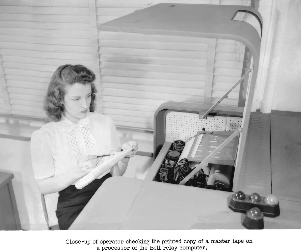 Publicity Photos of Bell Computing Machines at 19 Foot Pressure Tunnel Mrs. Doris Rudd Porter Baron photographed in the photos.