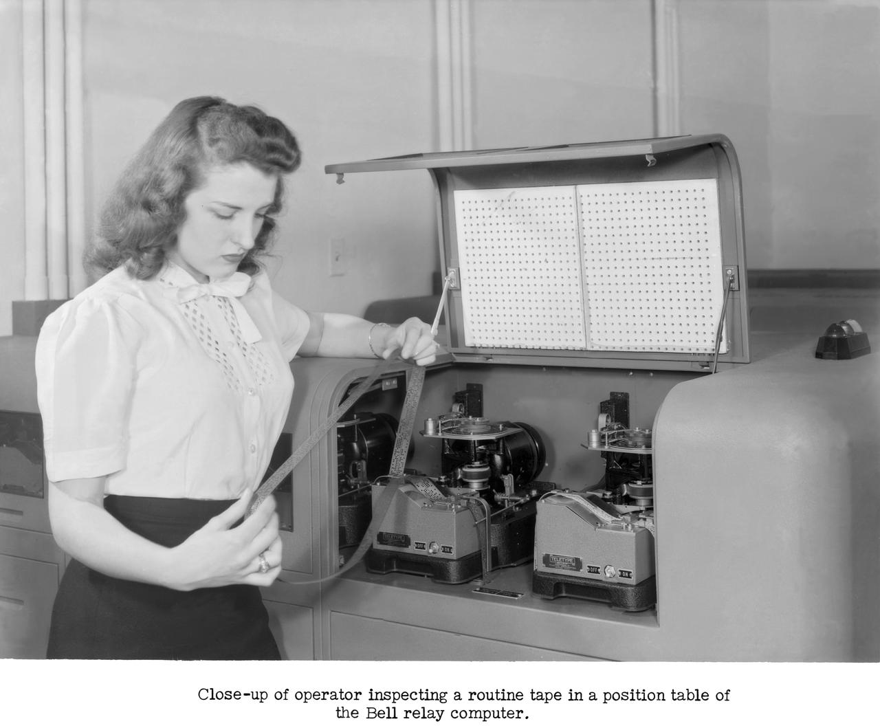 Publicity Photos of Bell Computing Machines at 19 Foot Pressure Tunnel Mrs. Doris Rudd Porter Baron photographed in the photos.