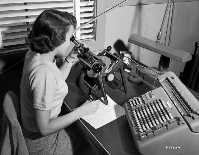 NASA image: Langely Women Computer with X-4 with Friden machine