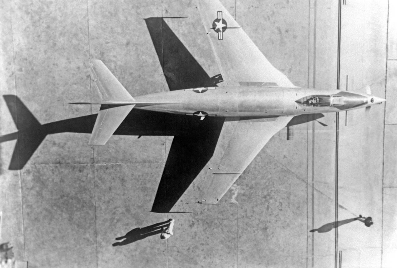 91,591  Overhead view. McDonnell XF-88B Experimental Jet Fighter. Langley used this aircraft in the mid-1950s to explore the potential of a supersonic propeller. Photographed in Engineer in Charge A History of the Langley Aeronautical Laboratory, 1917-1958 by James R. Hansen. Page 508. **Note see L57-2259 for eye level view.