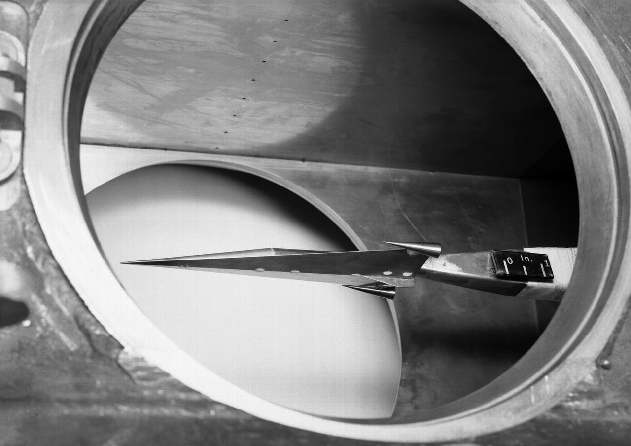 Hypersonic Boost Glider  in 11 Inch Hypersonic Tunnel L57-1681 In 1957 Langley tested its HYWARDS design in the 11 Inch Hypersonic Tunnel. Photograph published in Engineer in Charge: A History of the Langley Aeronautical Laboratory, 1917-1958 by James R. Hansen. Page 369. 