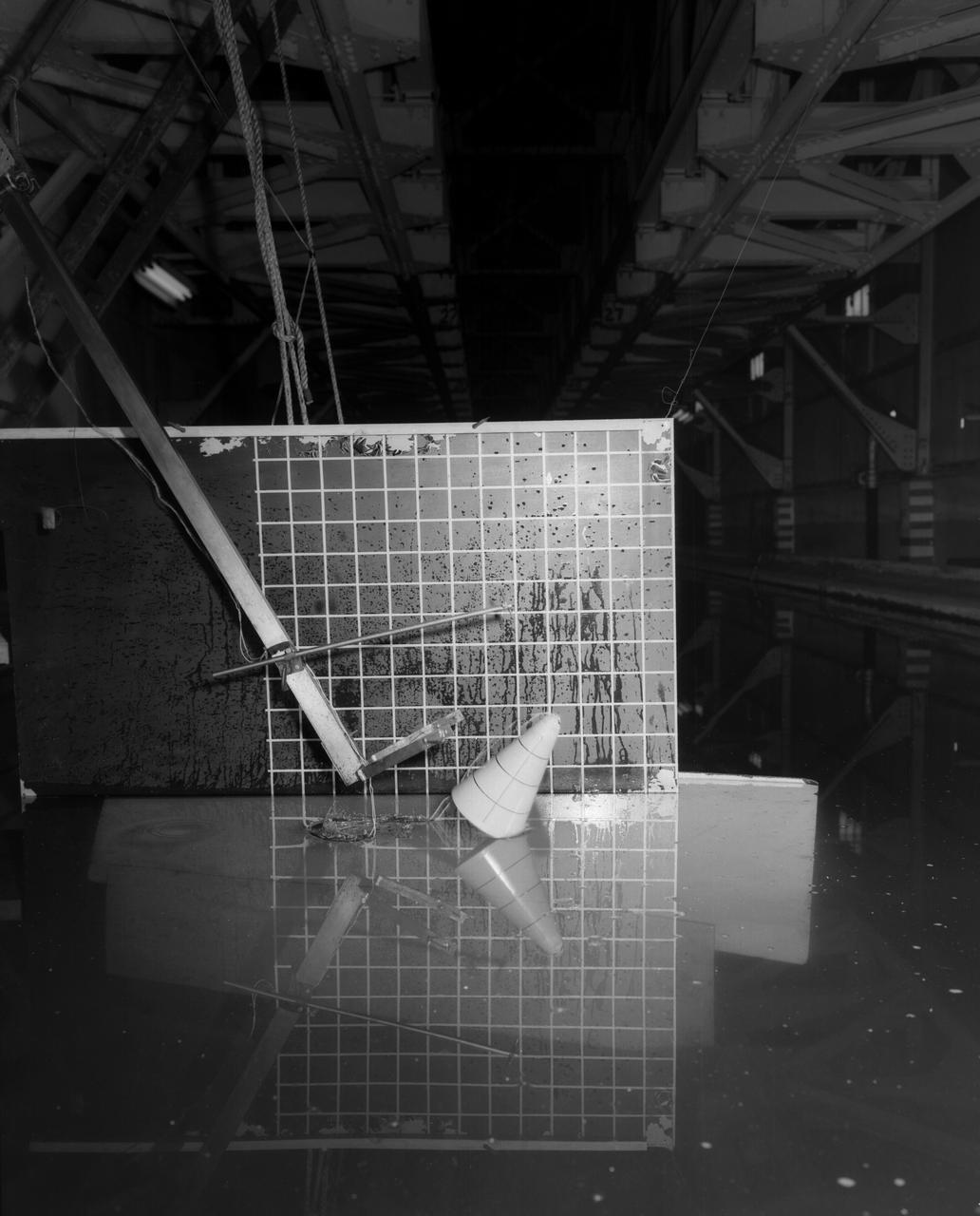 Testing of Mercury Capsule Shape A by the Hydrodynamics Division of Langley. Joseph Shortal wrote (vol. 3, p. 19):  The Hydrodynamics Division provided assistance in determining landing loads. In this connection, after PARD engineers had unofficially approached that division to make some water impact tests with the boilerplate capsule, J.B. Parkinson, Hydrodynamics Chief visited Shortal to find out if the request had his support. Finding out that it did, Parkinson said,  Its your capsule. If you want us to drop it in the water, we will do it.  From Shortal (Vol. 3, p. 16):  The basic design of the capsule was made by M.A. Faget and his coworkers at PARD during the winter of 1957-1958. It was natural, then, that extensive use was made of the facilities at Wallops during the development of the spacecraft. The tests at Wallops consisted of 26 full-size capsules, either launched from the ground by rocket power or dropped from airplanes at high altitude and 28 scaled models, either rocket boosted or released from balloons. Emphasis in the Wallops program was on dynamic stability and aerodynamic heating of the capsule, and effectiveness of the pilot-escape and parachute-recovery systems. The biggest part of the Wallops program was the series of full-size capsules, rocket launched with the Little Joe booster, developed especially for Mercury.  -- Published in Joseph A. Shortal, History of Wallops Station: Origins and Activities Through 1949, (Wallops Island, VA: National Aeronautics and Space Administration, Wallops Station, nd), Comment Edition.