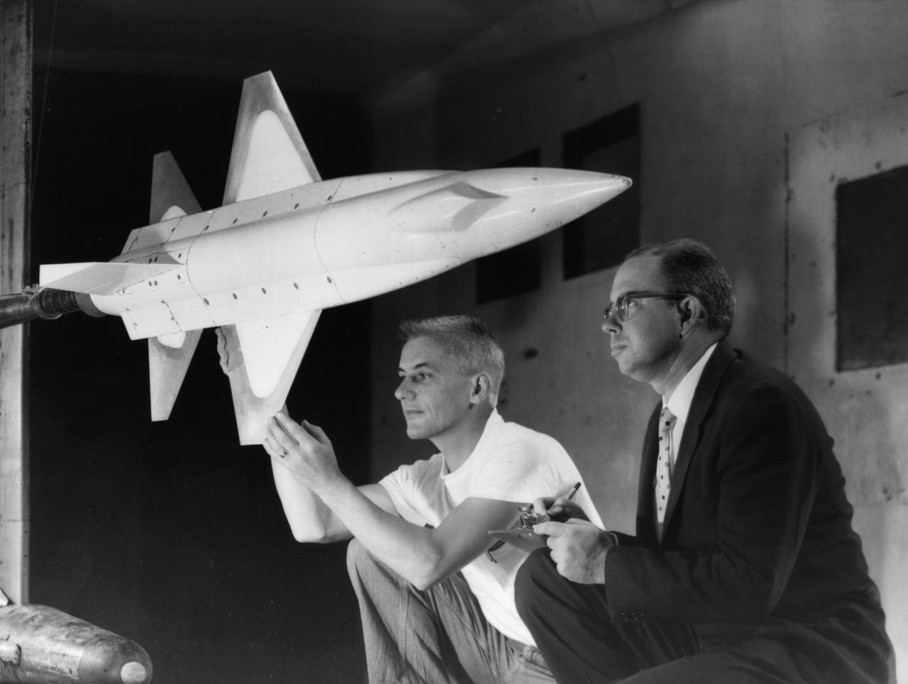 A 1/10th Scale Model of the X-15 research plane is prepared in Langley's 7 x 10 Foot Wind Tunnel for studies relating to spin characteristics. -- Photograph published in Winds of Change, 75th Anniversary NASA publication (page 66), by James Schultz.
