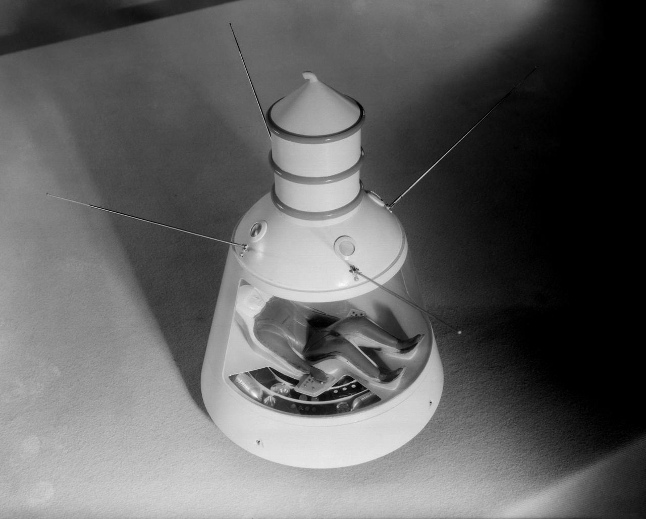 Scale model of Mercury capsule shape A, indicating the position of the astronaut.