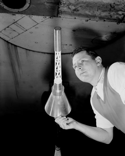 NASA image: Capsule model in 7 x 10 foot tunnel with rocket boom 