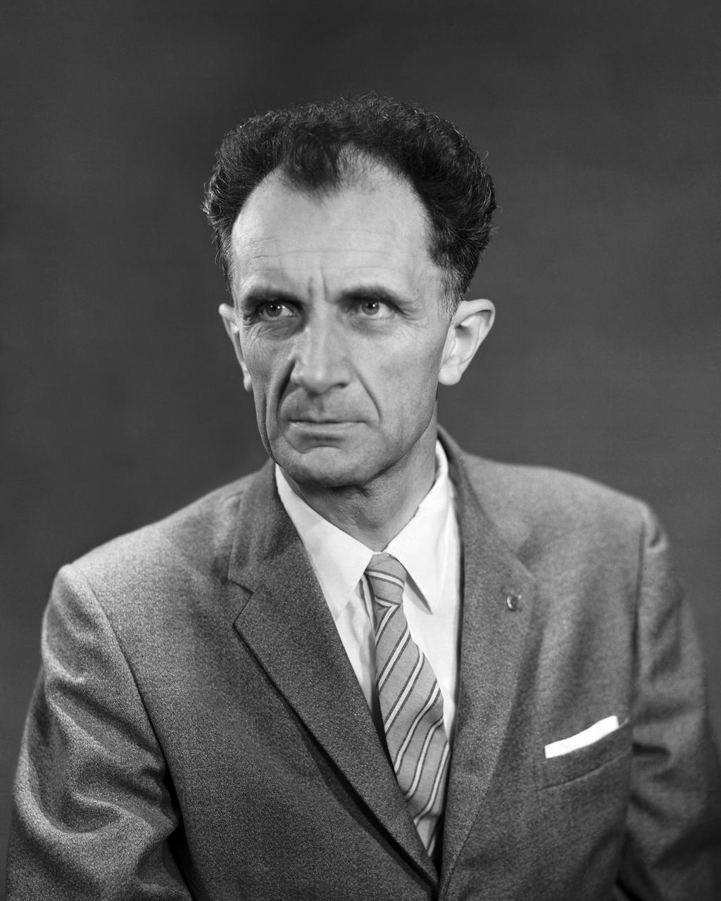 Adolf Busemann, the German aerodynamicist who first expressed the advantages of wing sweep in a 1935 theoretical paper, came to work at Langley in May 1947 as a result of Operation Paperclip. Photograph published in Engineer in Charge: A History of the Langley Aeronautical Laboratory, 1917-1958 by James R. Hansen. Page 283.