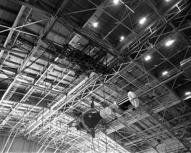 NASA image: Rendezvous Docking Simulator Suspended From the Roof of the West Area Hangar