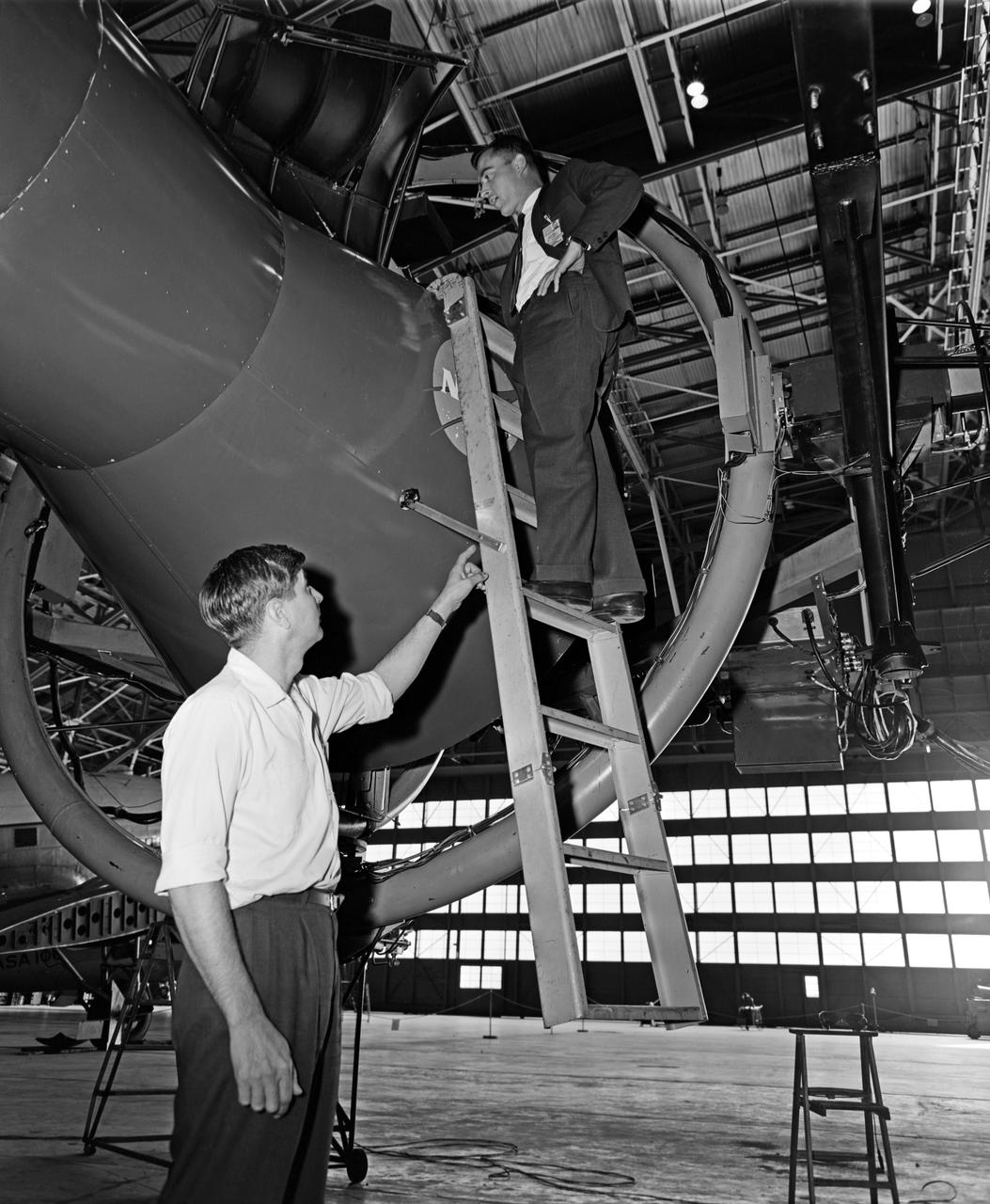 Astronaut John Young (above) was one of 14 astronauts, 8 NASA test pilots, and 2 McDonnell test pilots who took part in simulator studies. Young piloted the simulator on November 12, 1963 Arthur Vogeley wrote: "Many of the astronauts have flown this simulator in support of the Gemini studies and they, without exception, appreciated the realism of the visual scene. The simulator has also been used in the development of pilot techniques to handle certain jet malfunctions in order that aborts could be avoided. In these situations large attitude changes are sometimes necessary and the false motion cues that were generated due to earth gravity were somewhat objectionable; however, the pilots were readily able to overlook these false motion cues in favor of the visual realism." Roy F. Brissenden wrote: "The basic Gemini control studies developed the necessary techniques and demonstrated the ability of human pilots to perform final space docking with the specified Gemini-Agena systems using only visual references. ... Results... showed that trained astronauts can effect the docking with direct acceleration control and even with jet malfunctions as long as good visual conditions exist.... Probably more important than data results was the early confidence that the astronauts themselves gained in their ability to perform the maneuver in the ultimate flight mission." -- Published in Barton C. Hacker and James M. Grimwood, On the Shoulders of Titans: A History of Project Gemini, NASA SP-4203; A.W. Vogeley, "Discussion of Existing and Planned Simulators For Space Research," Paper presented at the Conference on the Role of Simulation in Space Technology, August 17-21, 1964; Roy F. Brissenden, "Initial Operations with Langley's Rendezvous Docking Facility," Langley Working Paper, LWP-21, 1964.