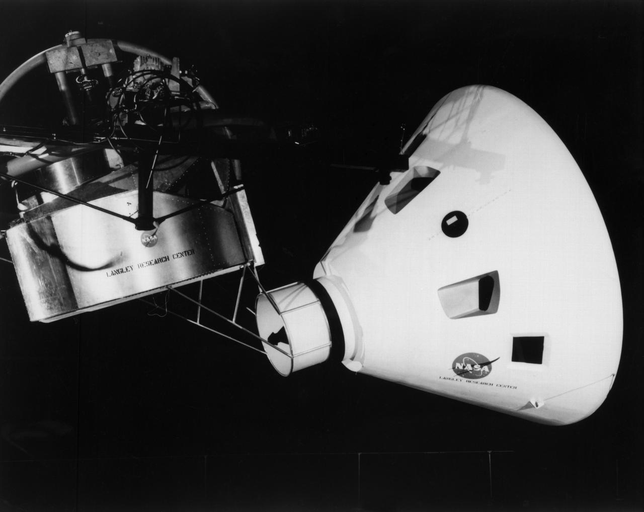 Originally the Rendezvous was used by the astronauts preparing for Gemini missions. The Rendezvous Docking Simulator was then modified and used to develop docking techniques for the Apollo program. "The LEM pilot's compartment, with overhead window and the docking ring (idealized since the pilot cannot see it during the maneuvers), is shown docked with the full-scale Apollo Command Module." A.W. Vogeley described the simulator as follows: "The Rendezvous Docking Simulator and also the Lunar Landing Research Facility are both rather large moving-base simulators. It should be noted, however, that neither was built primarily because of its motion characteristics. The main reason they were built was to provide a realistic visual scene. A secondary reason was that they would provide correct angular motion cues (important in control of vehicle short-period motions) even though the linear acceleration cues would be incorrect." -- Published in A.W. Vogeley, "Piloted Space-Flight Simulation at Langley Research Center," Paper presented at the American Society of Mechanical Engineers, 1966 Winter Meeting, New York, NY, November 27 - December 1, 1966;