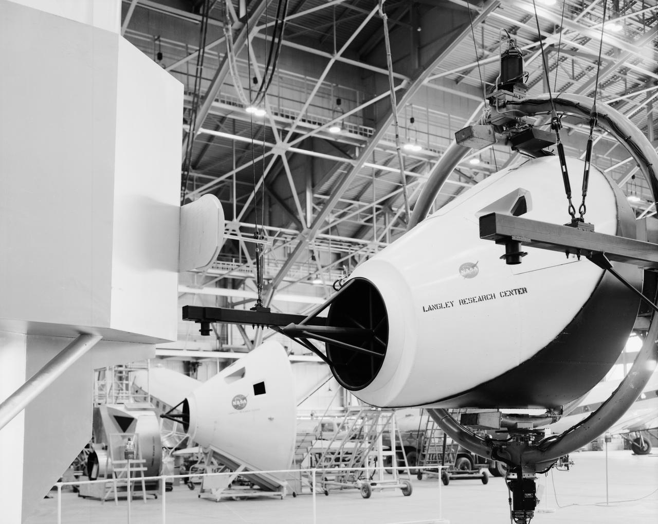 Originally the Rendezvous was used by the astronauts preparing for Gemini missions. The Rendezvous Docking Simulator was then modified and used to develop docking techniques for the Apollo program. This picture shows a later configuration of the Apollo docking with the LEM target. A.W. Vogeley described the simulator as follows:  The Rendezvous Docking Simulator and also the Lunar Landing Research Facility are both rather large moving-base simulators. It should be noted, however, that neither was built primarily because of its motion characteristics. The main reason they were built was to provide a realistic visual scene. A secondary reason was that they would provide correct angular motion cues (important in control of vehicle short-period motions) even though the linear acceleration cues would be incorrect.  -- Published in A.W. Vogeley,  Piloted Space-Flight Simulation at Langley Research Center,  Paper presented at the American Society of Mechanical Engineers, 1966 Winter Meeting, New York, NY, November 27 - December 1, 1966.