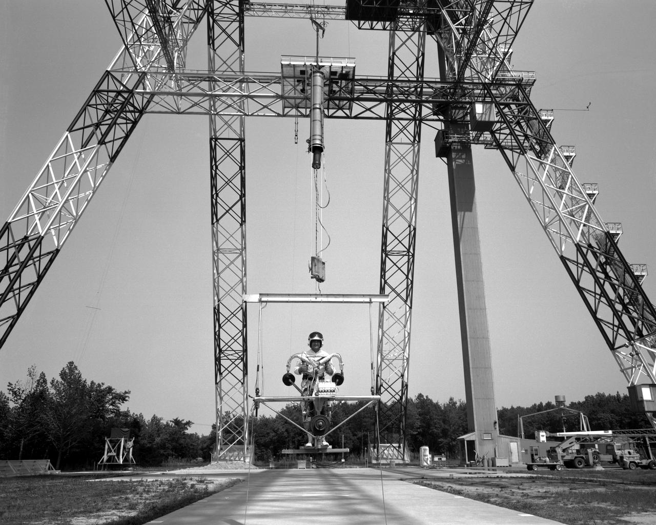 POGO is a device that uses cables connected to the ceiling to suspend an astronaut. POGO supports five-sixths of a person's weight; it mimics the one-sixth gravity of the moon. An astronaut walking around on POGO has the sensation of walking on the moon. POGO has been around since the Apollo days - in fact, the device gets its name from the way Apollo astronauts tended to bounce when suspended from it. The real name for POGO is the Partial Gravity Simulator.