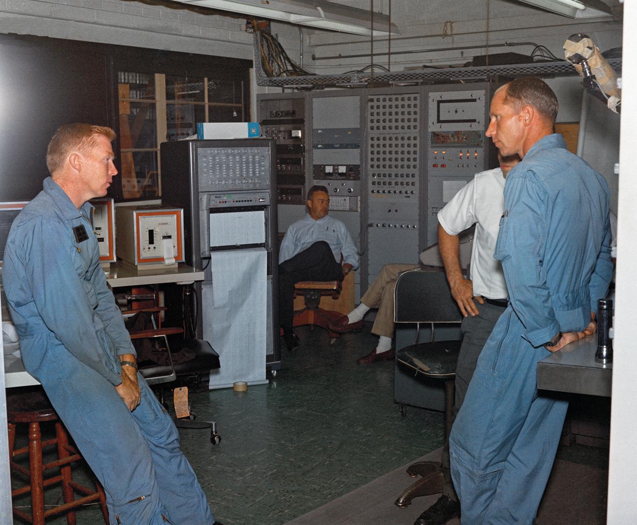 Astronauts Stuart A. Roosa, and Alfred M. Worden training a tRendezvous Docking Simulator NASA Langley.  Worden was one of the 19 astronauts selected by NASA in April 1966. He served as a member of the astronaut support crew for the Apollo 9 flight and as backup command module pilot for the Apollo 12 flight. Colonel Roosa was one of the 19 astronauts selected by NASA in April 1966. He was a member of the astronaut support crew for the Apollo 9 flight.