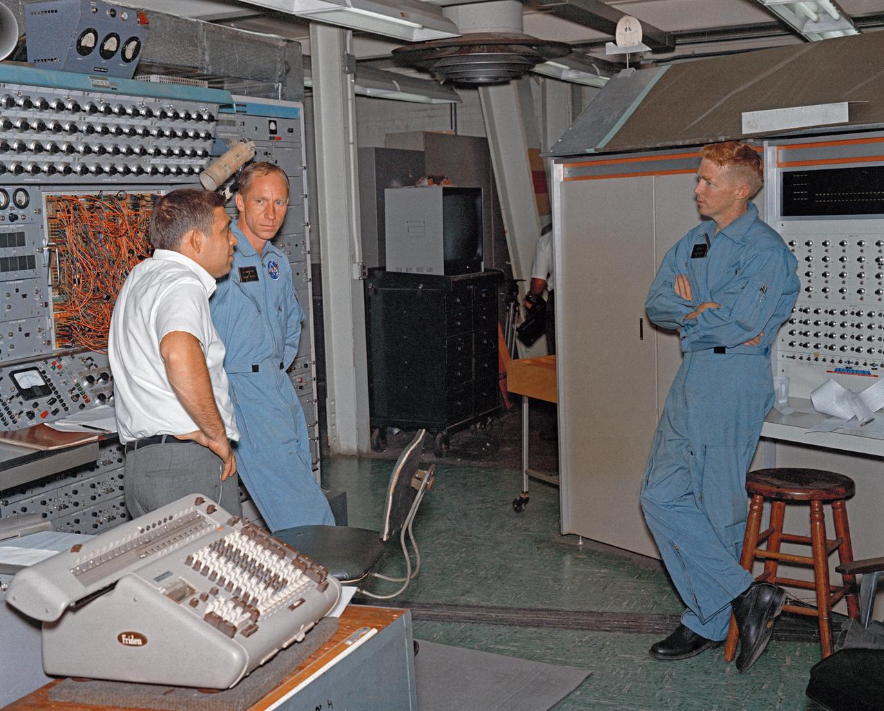 Astronauts Stuart A. Roosa, and Alfred M. Worden training a tRendezvous Docking Simulator NASA Langley.  Worden was one of the 19 astronauts selected by NASA in April 1966. He served as a member of the astronaut support crew for the Apollo 9 flight and as backup command module pilot for the Apollo 12 flight. Colonel Roosa was one of the 19 astronauts selected by NASA in April 1966. He was a member of the astronaut support crew for the Apollo 9 flight.