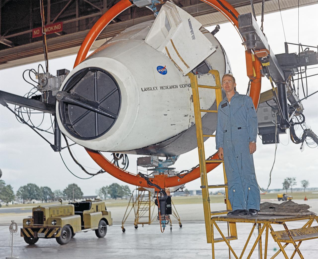 Astronauts Stuart A. Roosa, and Alfred M. Worden training a tRendezvous Docking Simulator NASA Langley.  Worden was one of the 19 astronauts selected by NASA in April 1966. He served as a member of the astronaut support crew for the Apollo 9 flight and as backup command module pilot for the Apollo 12 flight. Colonel Roosa was one of the 19 astronauts selected by NASA in April 1966. He was a member of the astronaut support crew for the Apollo 9 flight.