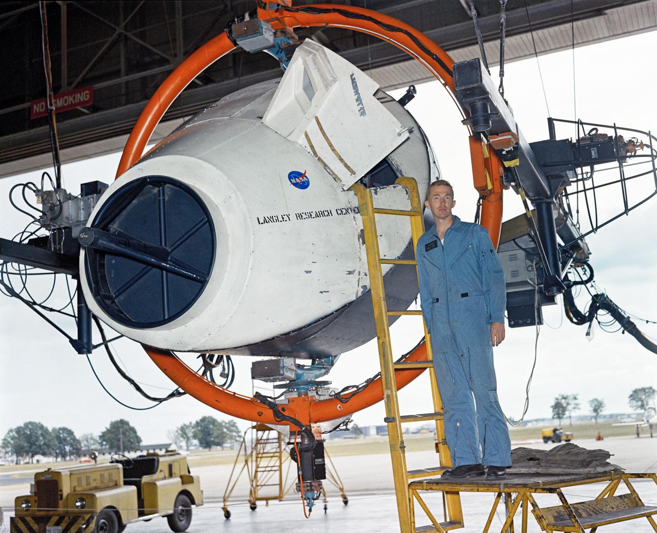 Astronauts Stuart A. Roosa, and Alfred M. Worden training a tRendezvous Docking Simulator NASA Langley.  Worden was one of the 19 astronauts selected by NASA in April 1966. He served as a member of the astronaut support crew for the Apollo 9 flight and as backup command module pilot for the Apollo 12 flight. Colonel Roosa was one of the 19 astronauts selected by NASA in April 1966. He was a member of the astronaut support crew for the Apollo 9 flight.