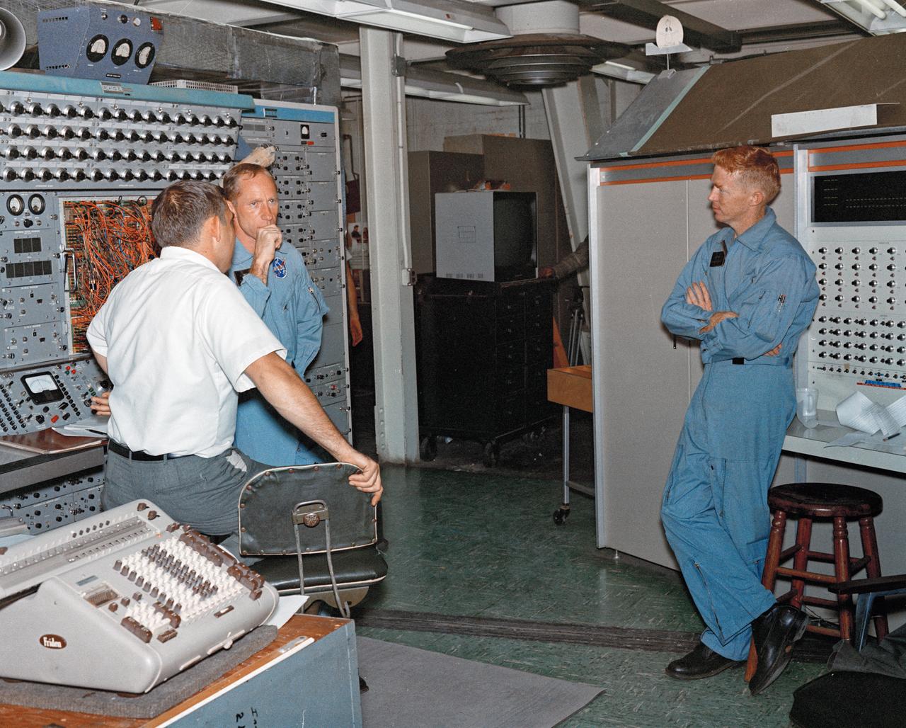 Astronauts Stuart A. Roosa, and Alfred M. Worden training a tRendezvous Docking Simulator NASA Langley.  Worden was one of the 19 astronauts selected by NASA in April 1966. He served as a member of the astronaut support crew for the Apollo 9 flight and as backup command module pilot for the Apollo 12 flight. Colonel Roosa was one of the 19 astronauts selected by NASA in April 1966. He was a member of the astronaut support crew for the Apollo 9 flight.