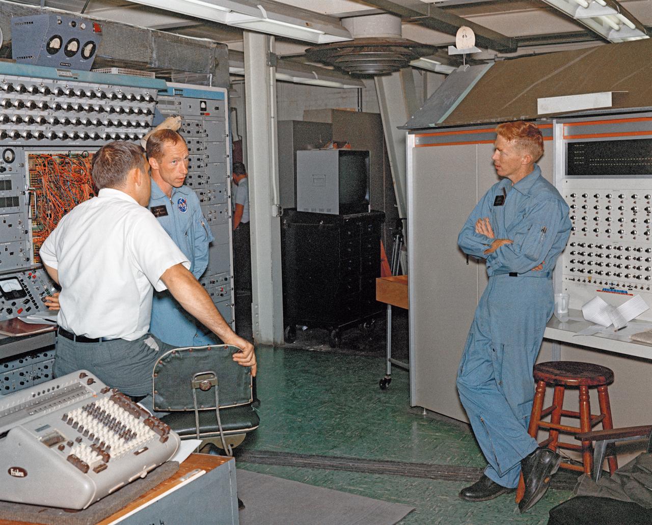 Astronauts Stuart A. Roosa, and Alfred M. Worden training a tRendezvous Docking Simulator NASA Langley.  Worden was one of the 19 astronauts selected by NASA in April 1966. He served as a member of the astronaut support crew for the Apollo 9 flight and as backup command module pilot for the Apollo 12 flight. Colonel Roosa was one of the 19 astronauts selected by NASA in April 1966. He was a member of the astronaut support crew for the Apollo 9 flight.