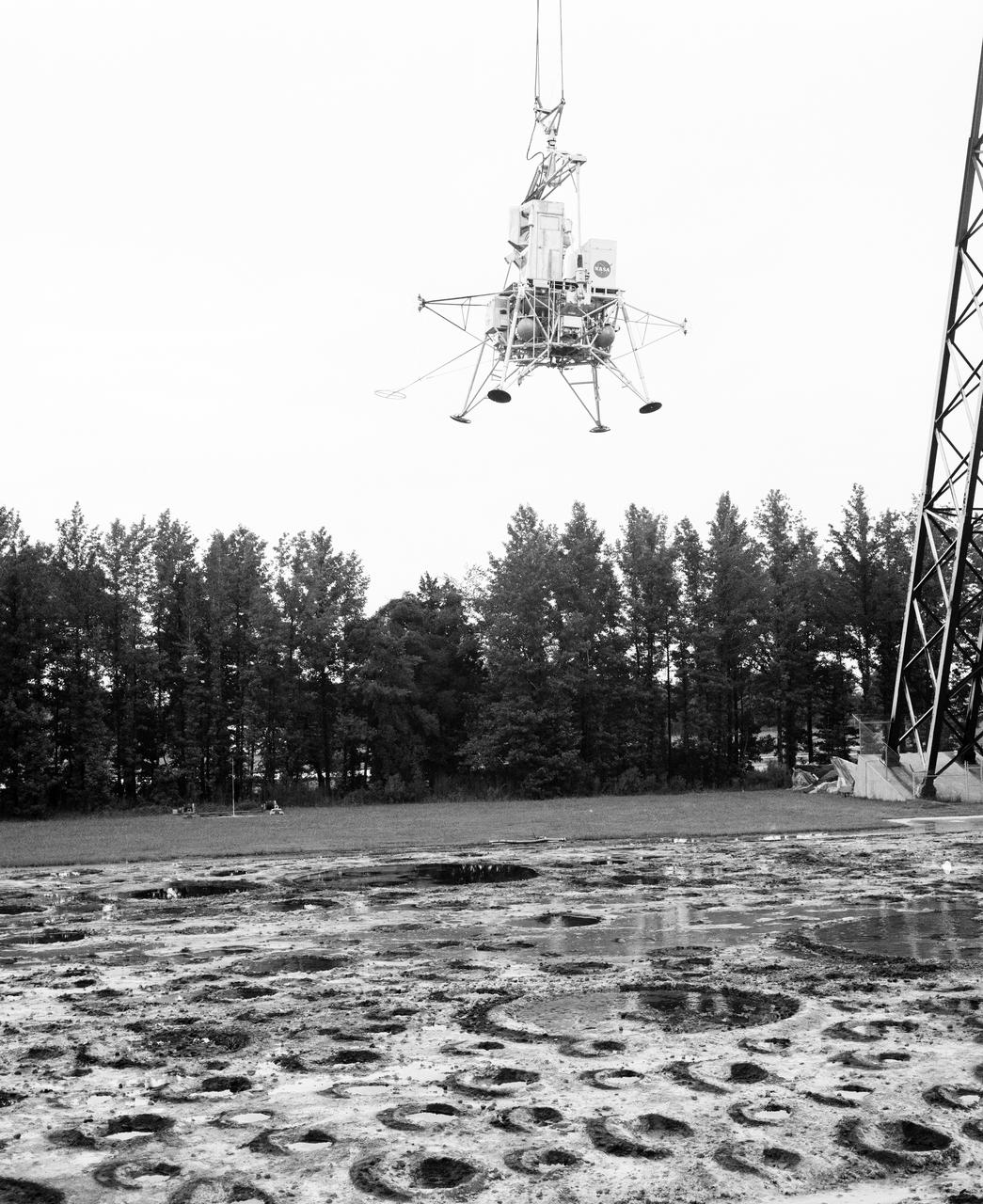 Astronauts Conrad and Bean at Lunar Landing Research Facility.  Alan Bean was one of the third group of astronauts named by NASA in October 1963. He served as backup astronaut for the Gemini 10 and Apollo 9 missions. In September of 1962, Mr. Conrad was selected as an astronaut by NASA. His first flight was Gemini V, which established the space endurance record and placed the United States in the lead for man-hours in space. As commander of Gemini XI, Mr. Conrad helped to set a world's altitude record. He then served as commander of Apollo XII, the second lunar landing. On Mr. Conrad's final mission, he served as commander of Skylab II, the first United States Space Station. https://www.nasa.gov/astronauts/biographies/former for more information.